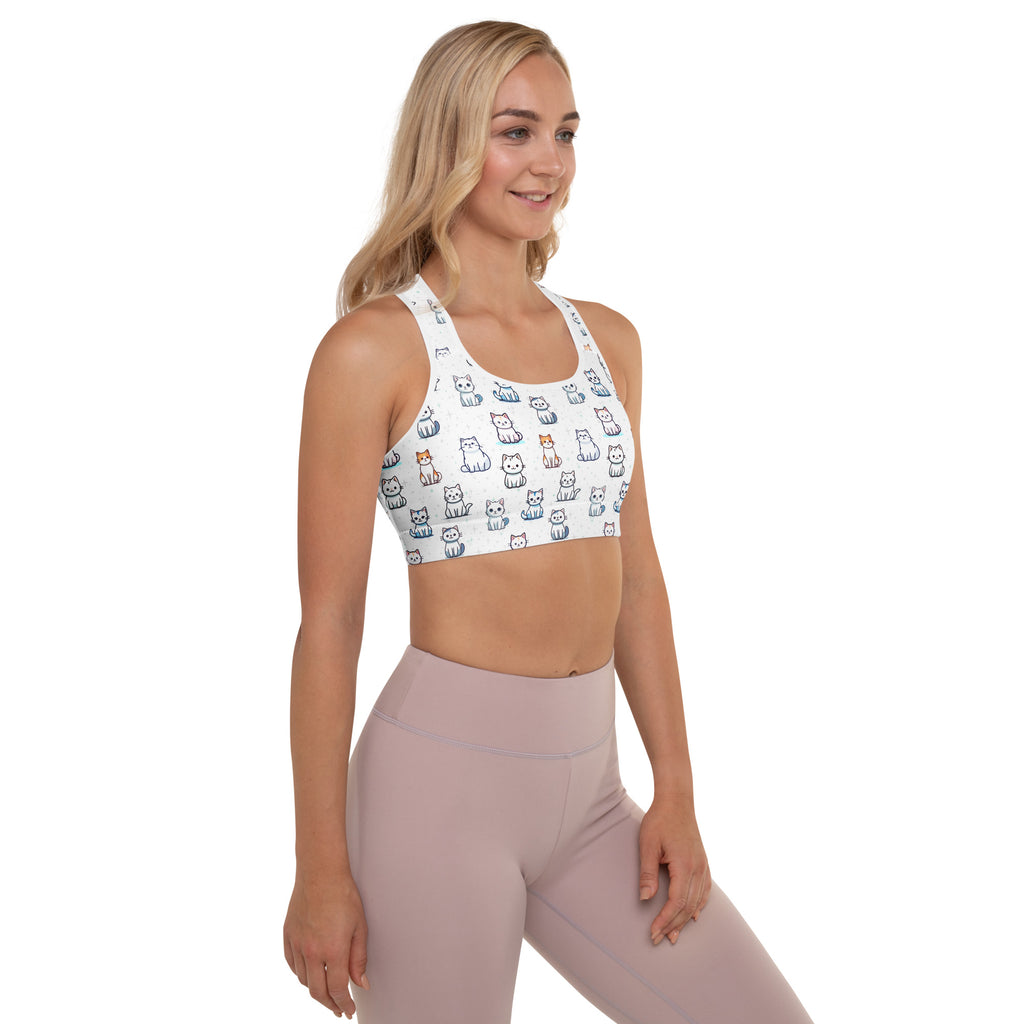 White padded sports bra with playful multicolored cartoon cats pattern buttery soft supportive quick-dry material