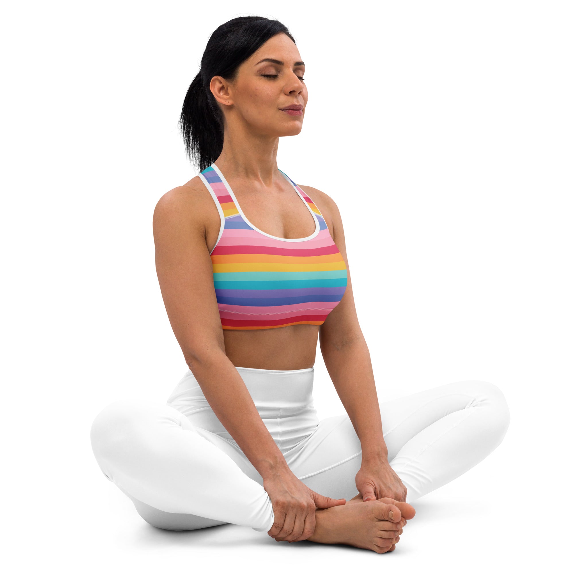 Women’s bright striped rainbow padded sports bra with white trim made of buttery soft quick-dry stretchy fabric