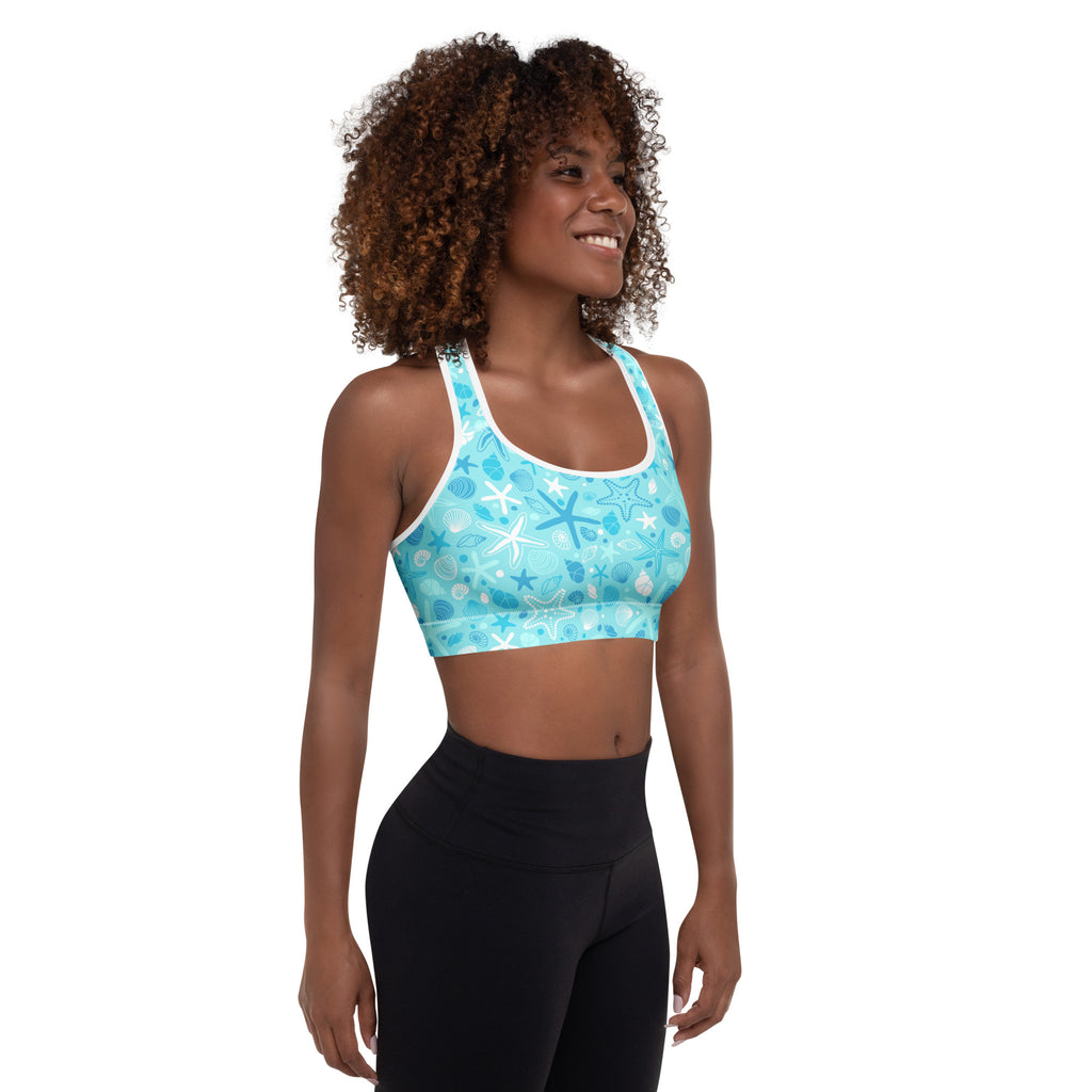 Women’s light blue padded sports bra with ocean-themed starfish and seashell pattern buttery soft and quick-dry