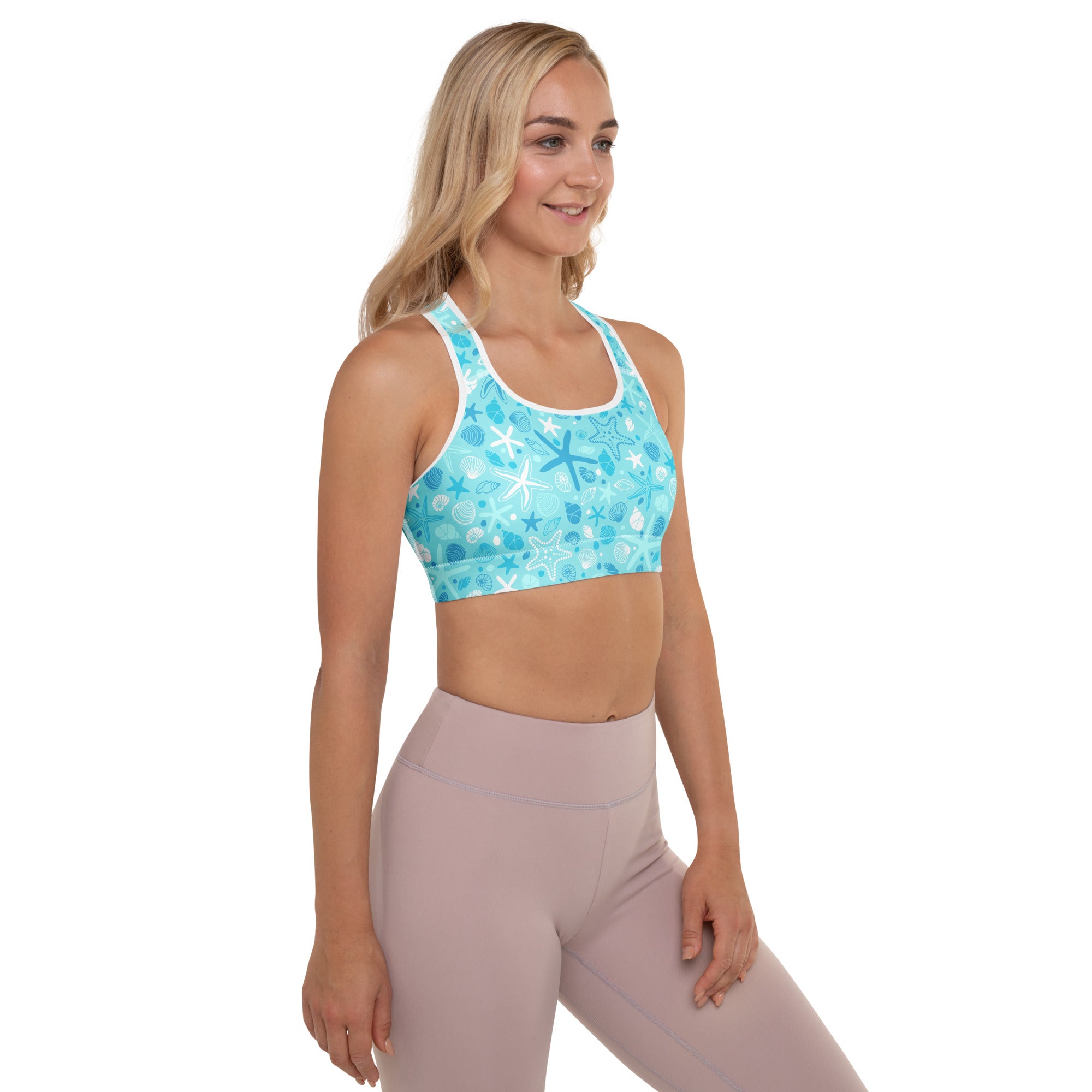 Women’s light blue starfish and shells padded sports bra with white trim buttery soft supportive and quick-dry