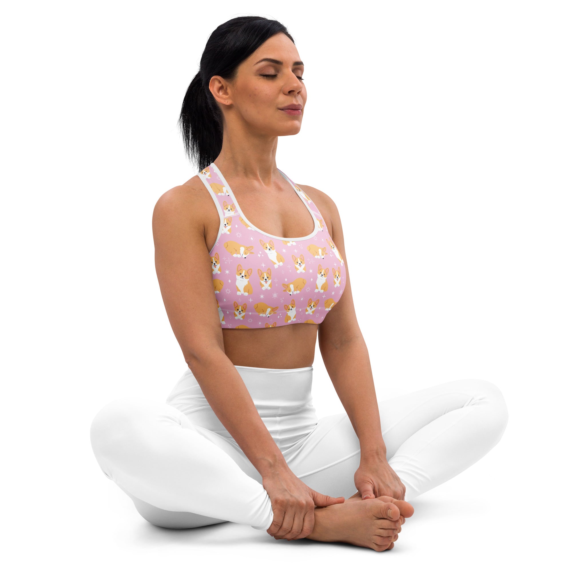 Women’s pink corgi dog padded sports bra with white trim buttery soft supportive and quick-dry material