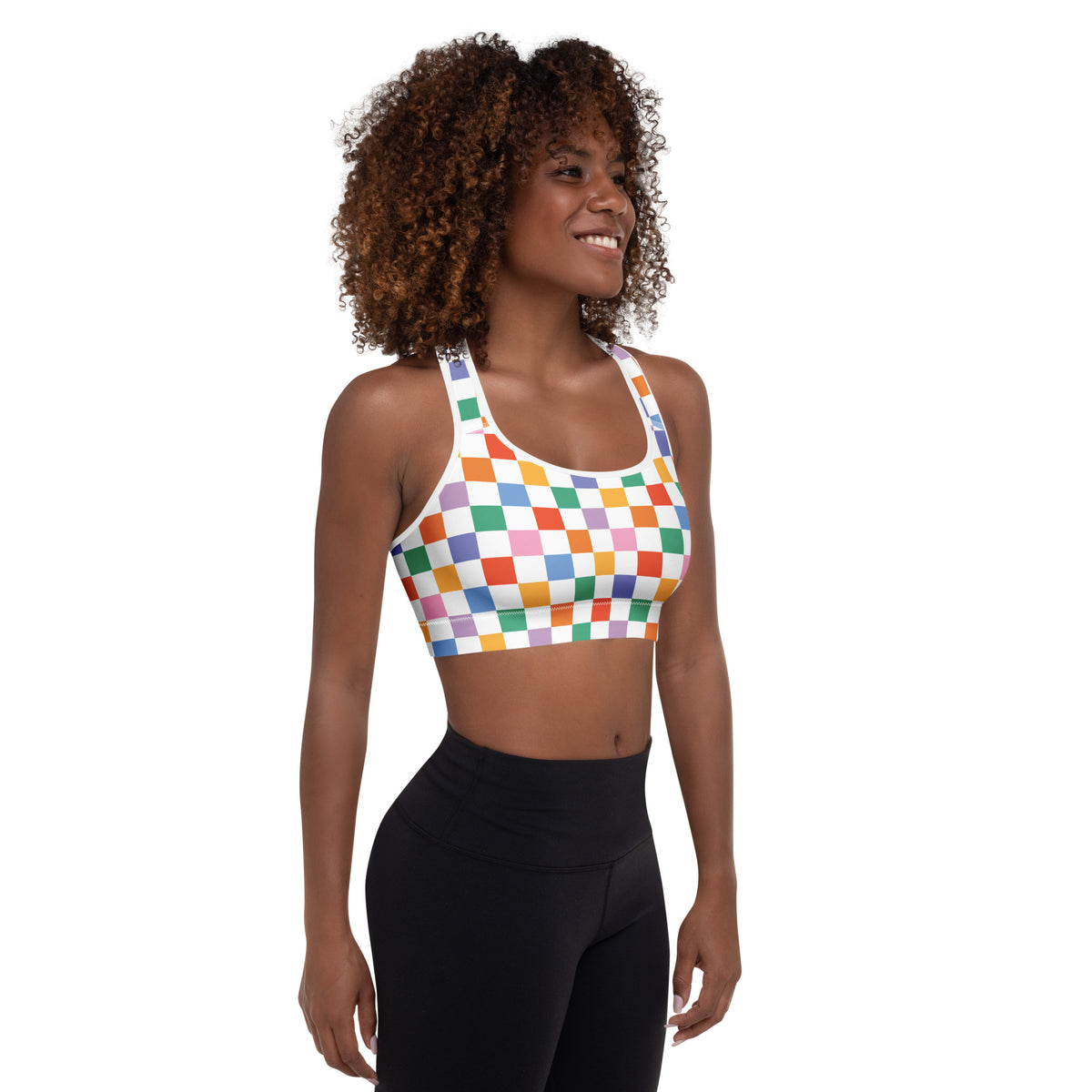 Women’s colorful checkerboard padded sports bra with vibrant rainbow print white straps and quick-dry stretchy fabric