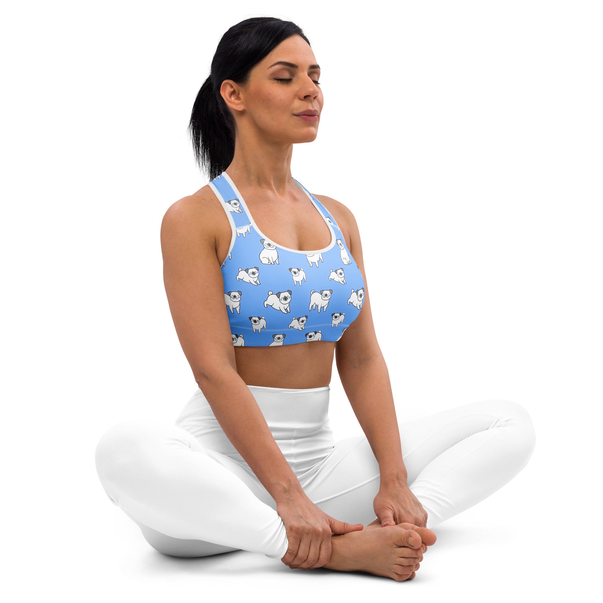 Women’s blue pug padded sports bra with white pug illustrations buttery soft supportive and quick-dry fabric