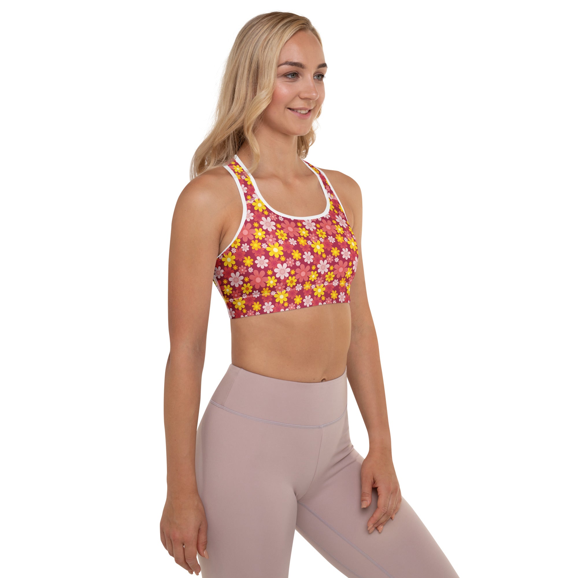 Women’s red floral padded sports bra with vibrant pink and yellow print white trim buttery soft supportive quick-dry