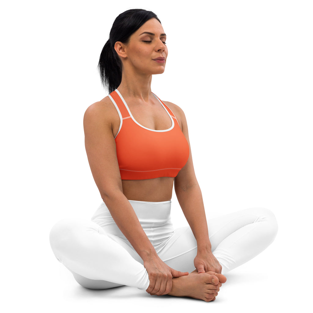 Women’s orange padded sports bra with white trim buttery soft supportive and quick-dry fabric for active use