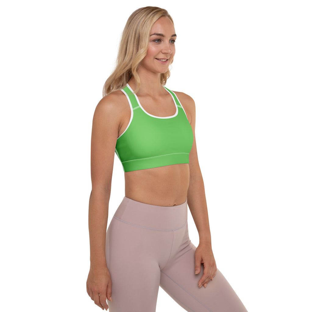 Bright green women’s padded sports bra with white trim seamless design buttery soft supportive and quick dry