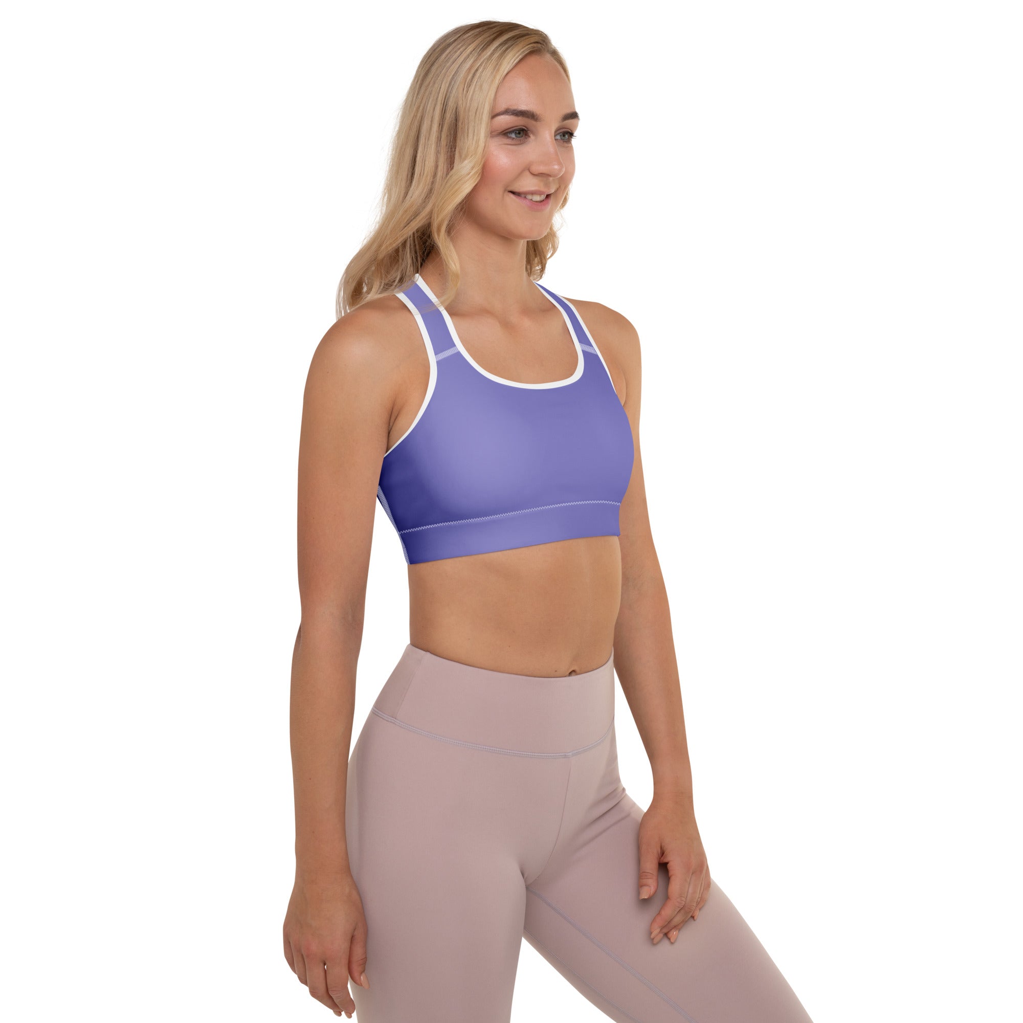 Women’s purple padded sports bra with white trim, buttery soft fabric, supportive fit, and quick-dry material