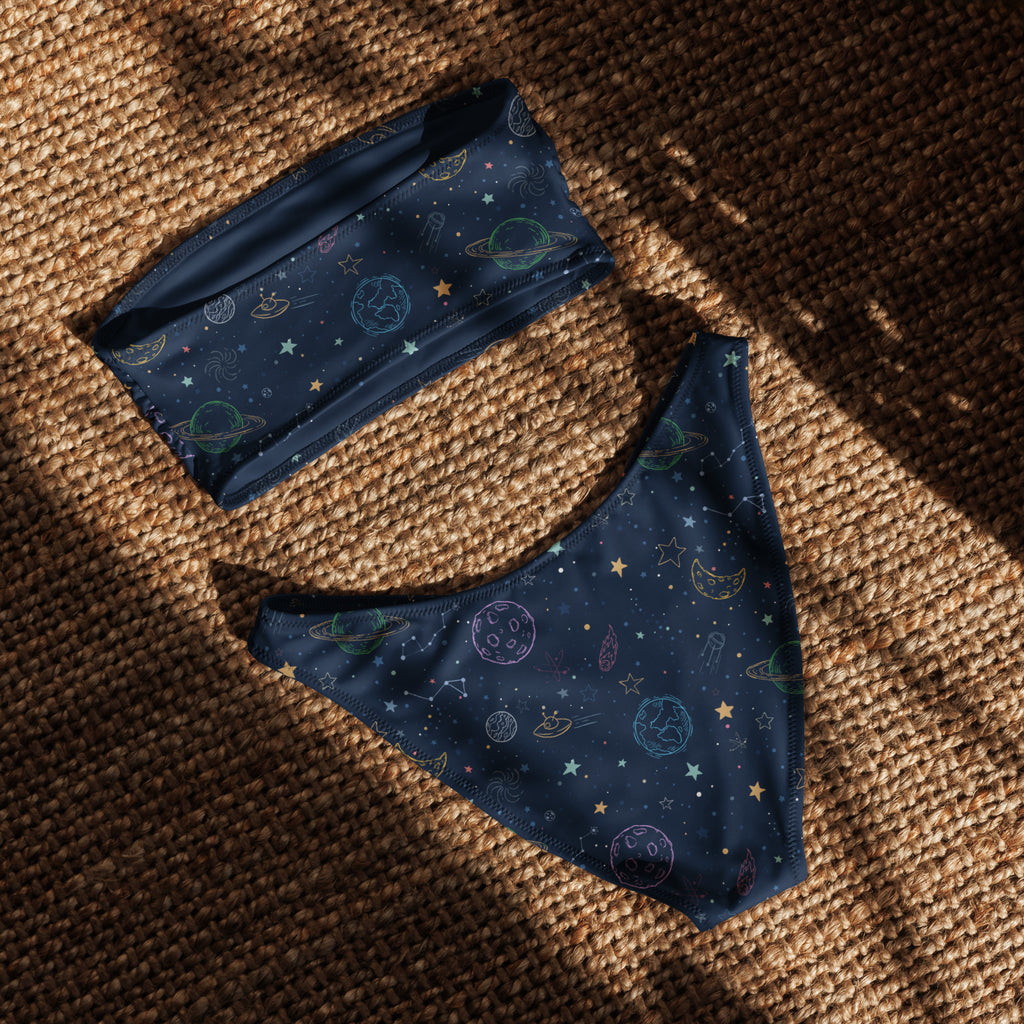 Navy blue space-themed women’s bandeau bikini with embroidered pastel planets stars moons quick drying upf 50+ fabric