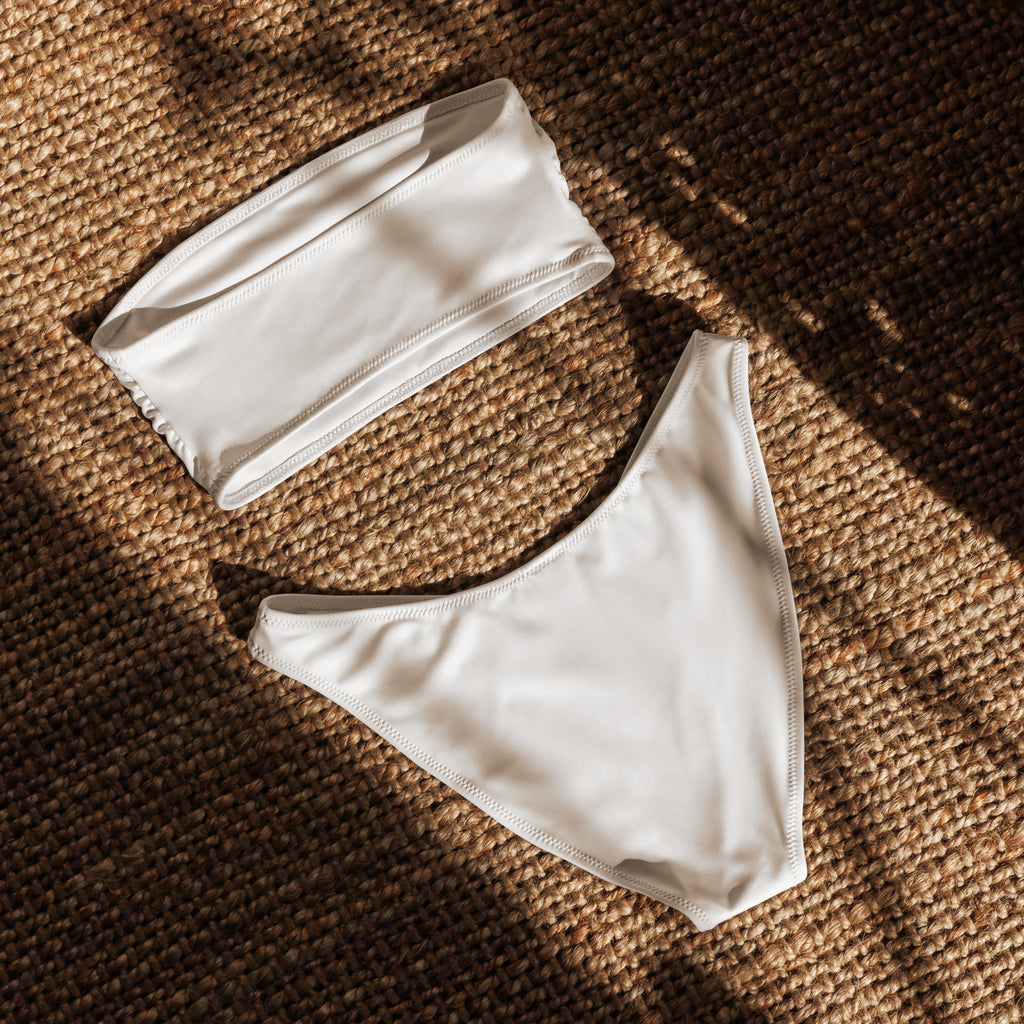White bandeau bikini set made from smooth stretchy quick drying fabric with upf 50 plus and neat stitched edges
