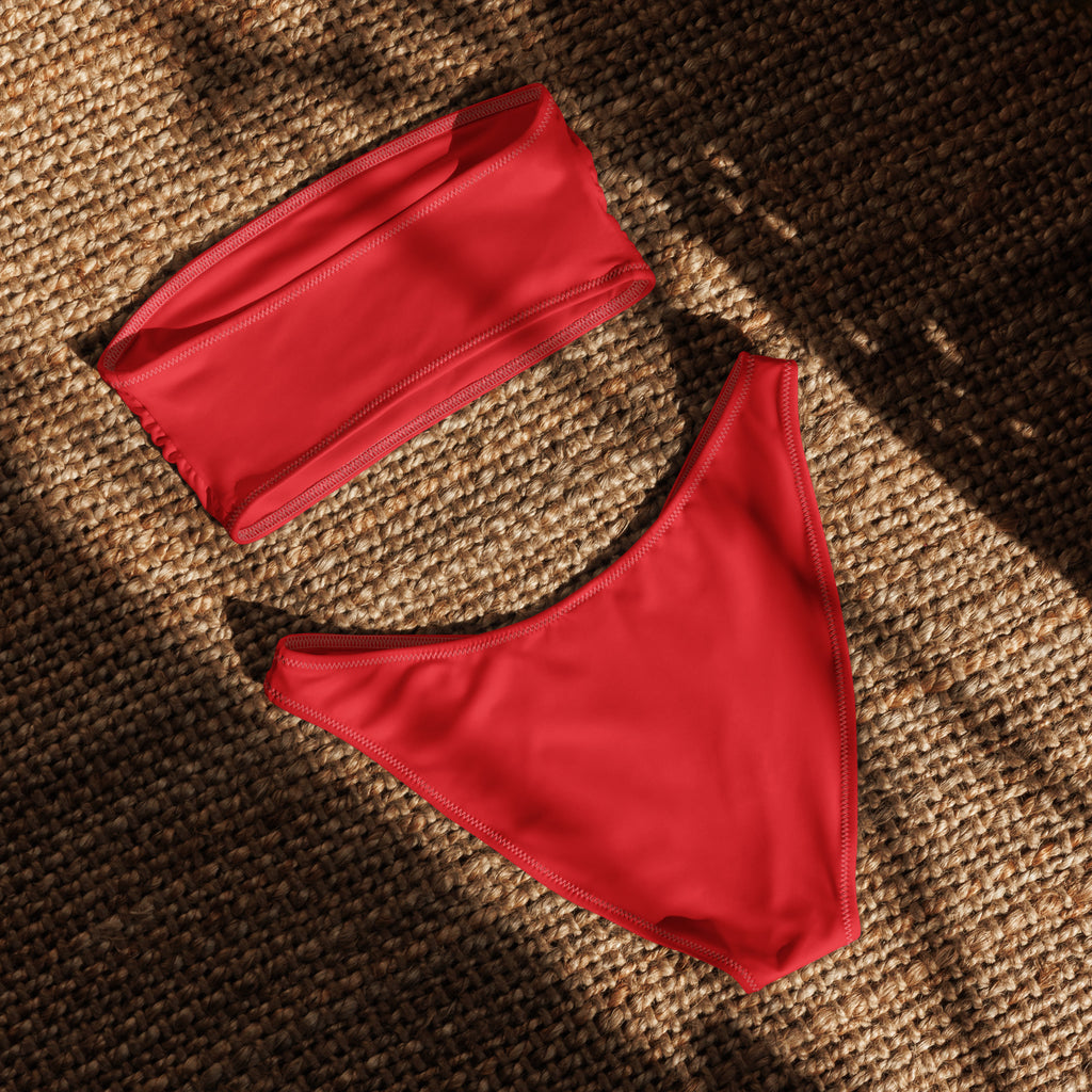 Women’s red recycled bandeau bikini made of smooth stretchy fabric with quick drying and upf 50 plus protection
