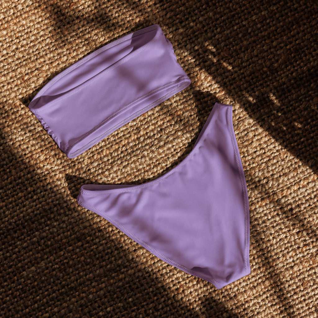 Women’s lavender purple recycled bandeau bikini set with high-cut bottoms made from quick drying upf 50+ fabric