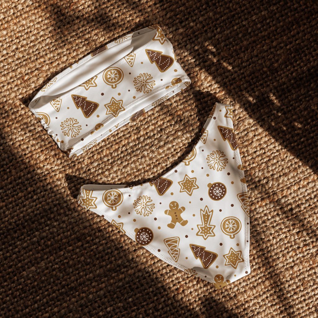 White baby bib and headband set with festive brown holiday designs complementing women’s gingerbread cookies recycled bandeau bikini
