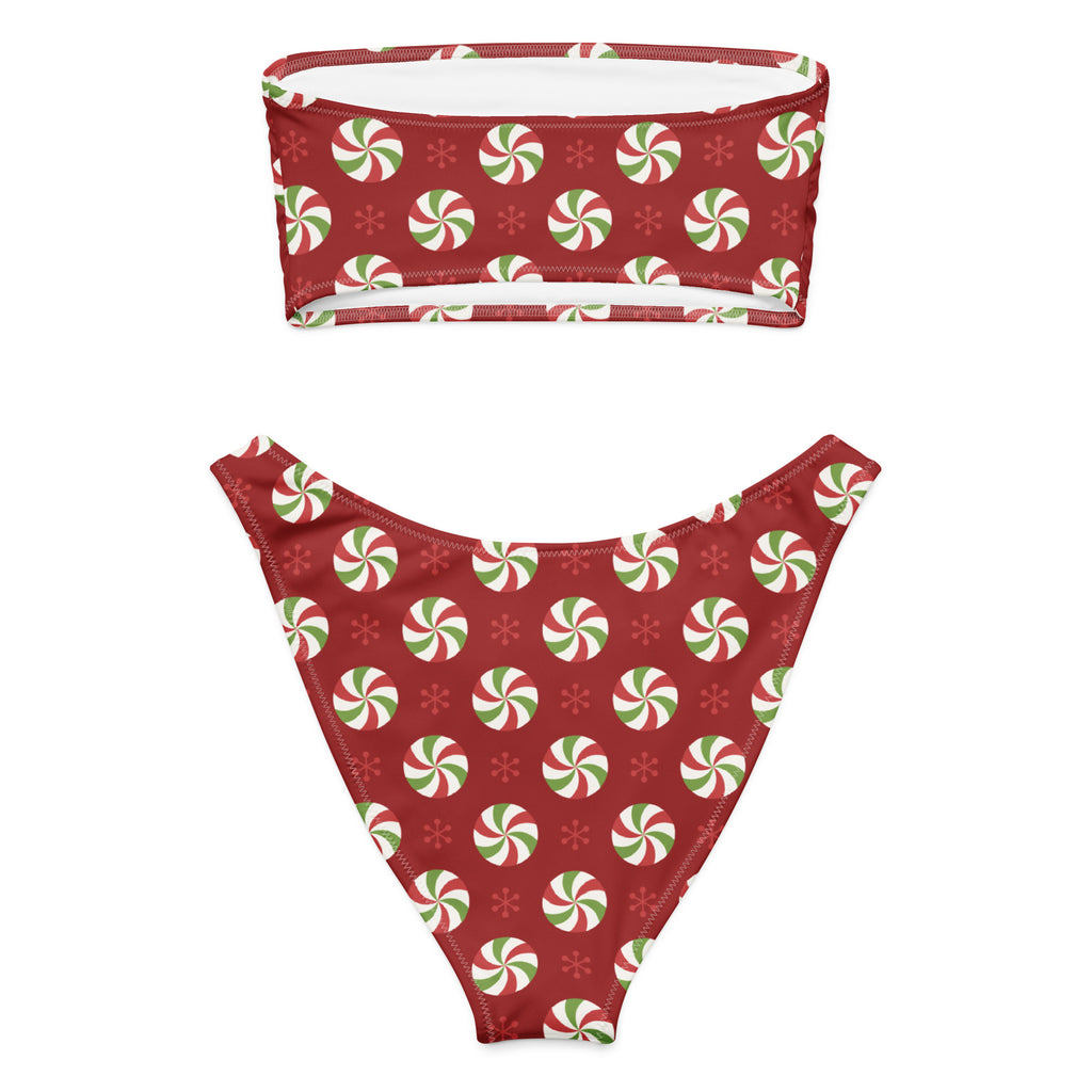 Women’s peppermint candy recycled bandeau bikini in red with green and white swirls and snowflake patterns with upf 50+