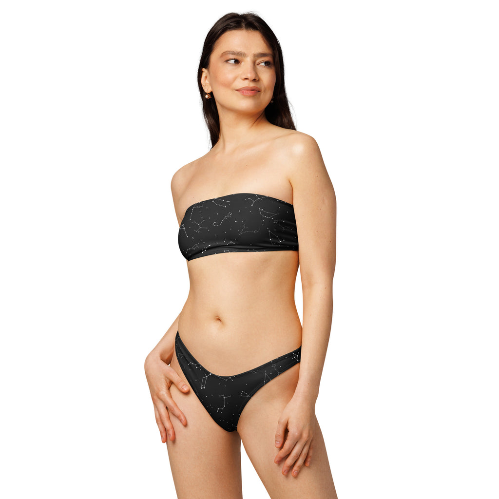 Black strapless bandeau bikini top and matching bottoms with subtle constellation pattern made from quick drying recycled fabric with upf 50+