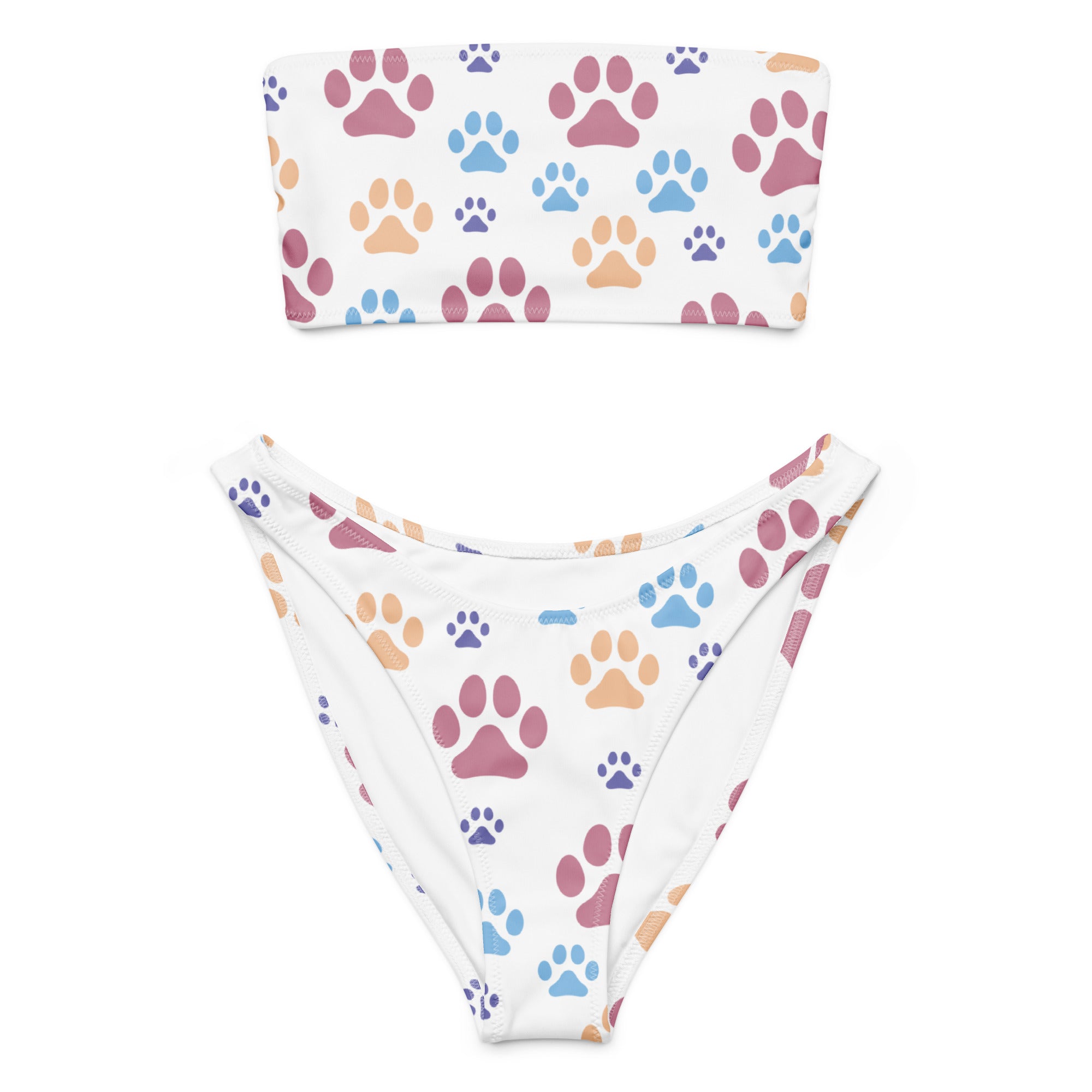 White bikini set with colorful paw prints featuring a bandeau top and high-cut bottoms made from quick drying recycled fabric with upf 50+