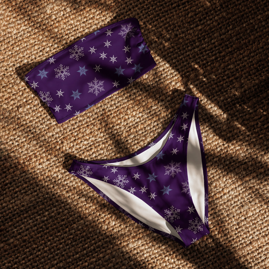 Women’s purple snowflake bandeau bikini set with white lining made from quick drying recycled fabric with upf 50+