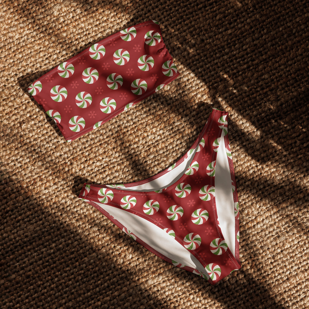 Women’s peppermint candy recycled bandeau bikini set in red and white candy cane pattern with upf 50+ quick dry fabric