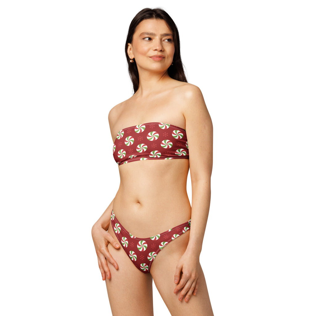 Women’s peppermint candy red and white strapless bikini set made from quick drying recycled fabric with upf 50+ protection