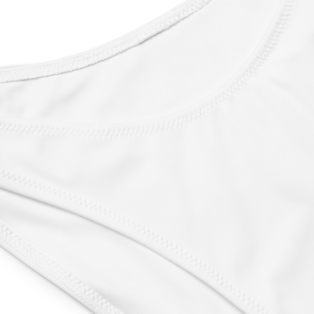 White seamless fabric with fine even stitching edges on the back of women’s usa recycled bandeau bikini quick drying fabric upf 50+