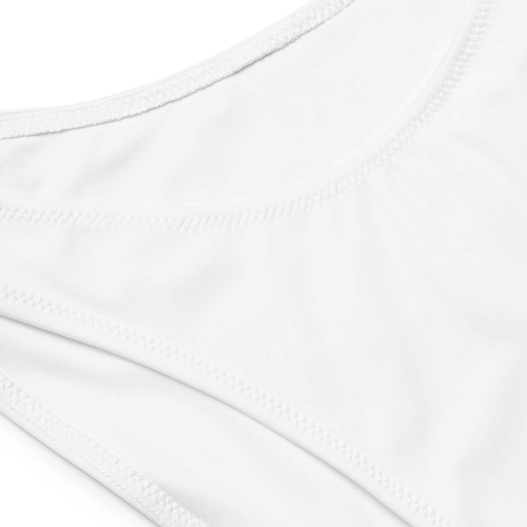 White seamless fabric with fine even stitching edges on the back of women’s usa recycled bandeau bikini quick drying fabric upf 50+