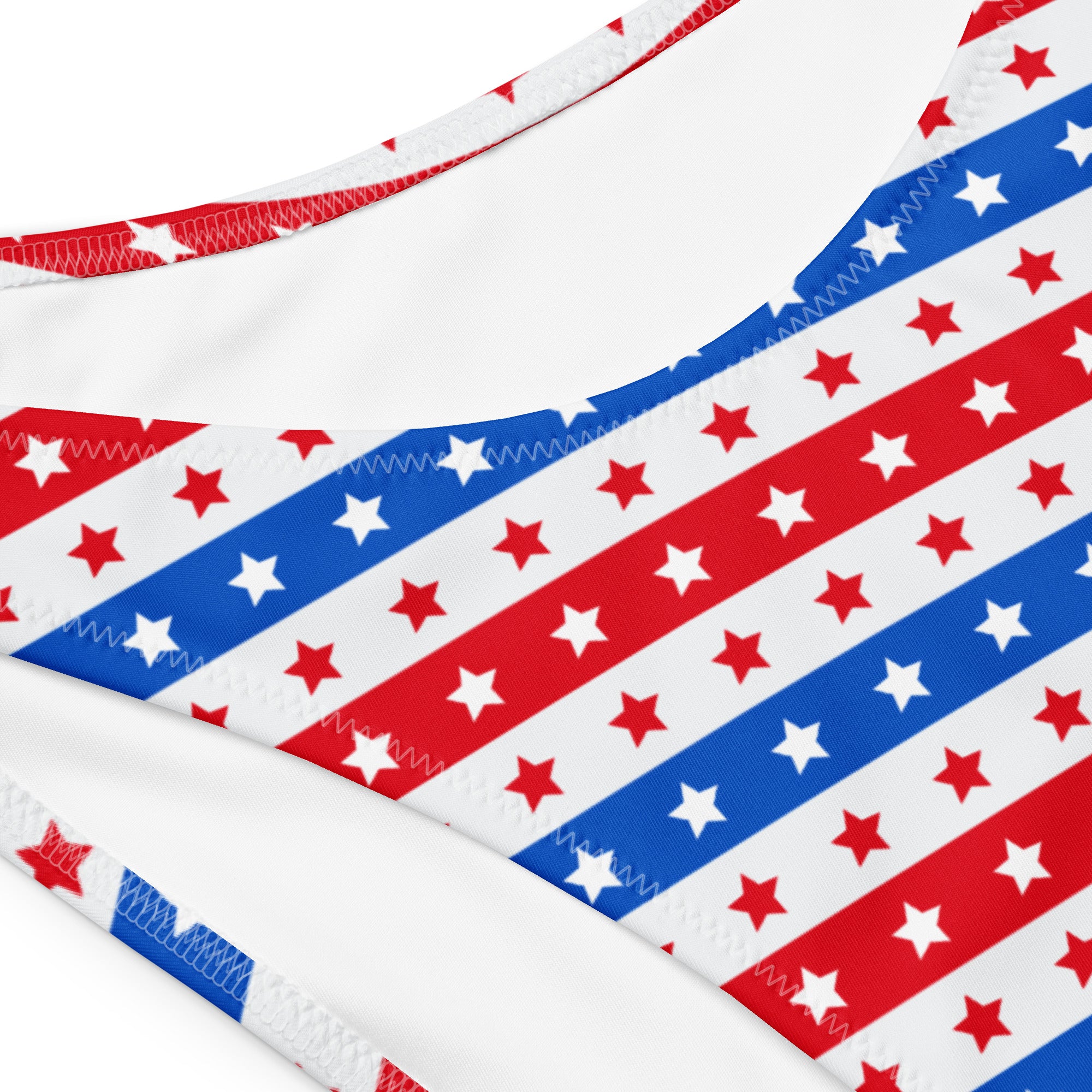 Women’s white red and blue striped star bandeau bikini top made from quick drying recycled fabric with upf 50