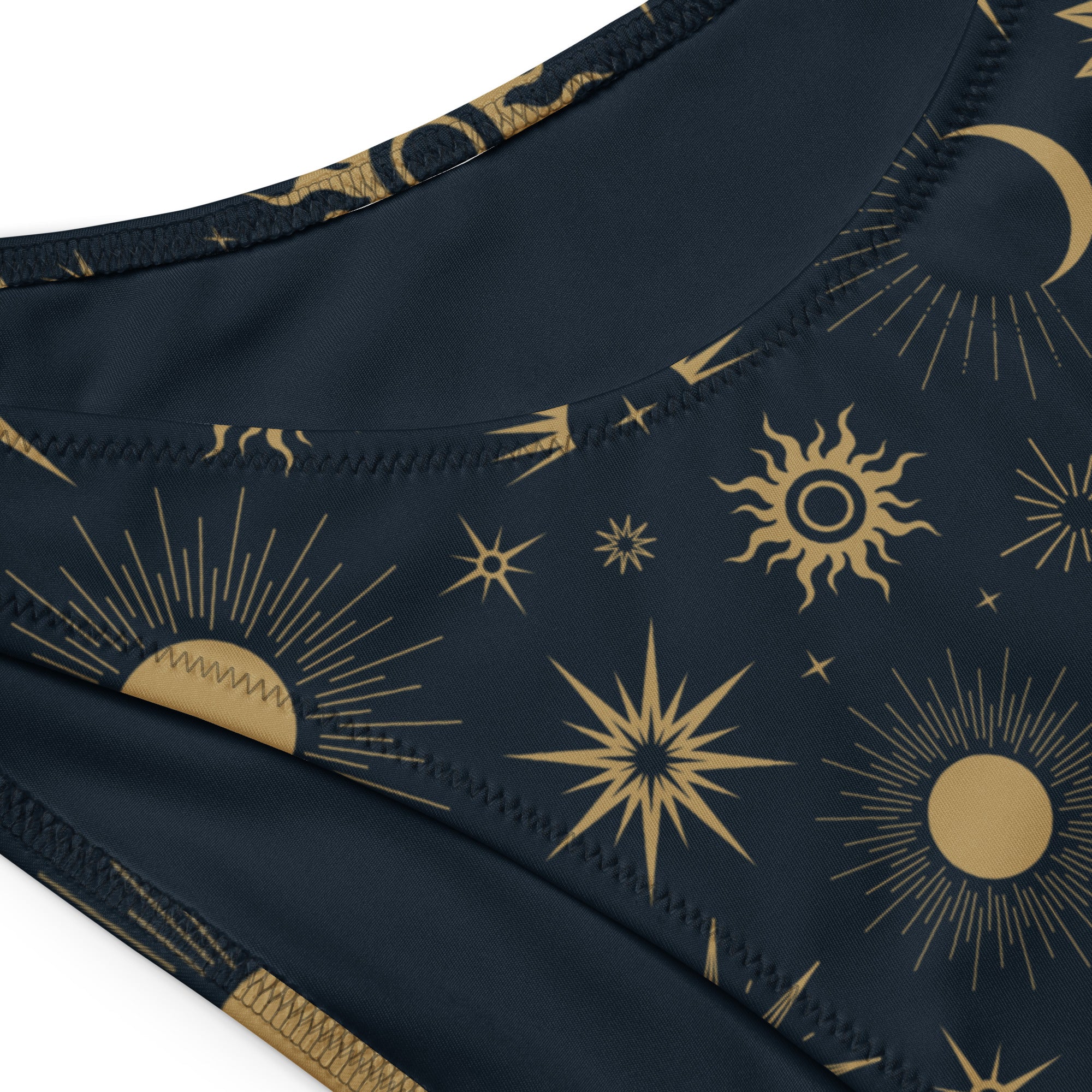 Dark navy recycled bandeau bikini top with gold sun moon and star celestial pattern quick drying fabric upf 50+