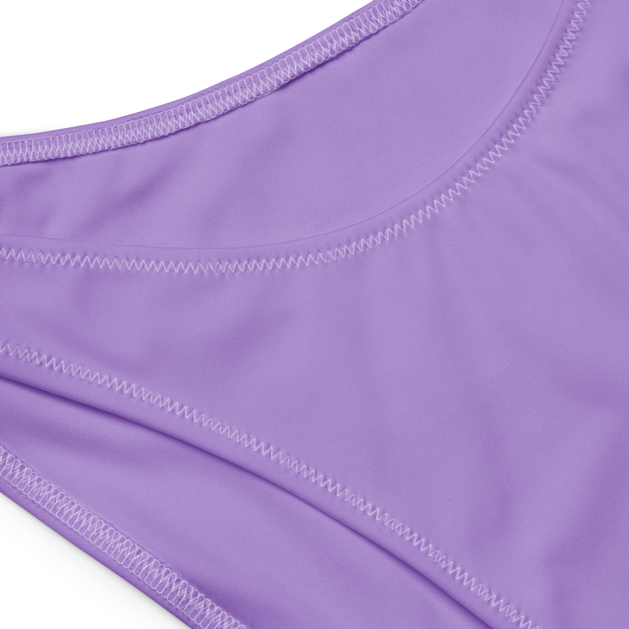 Purple stretch fabric bikini bottom with zigzag stitching from women’s lavender purple recycled bandeau bikini with UPF 50+