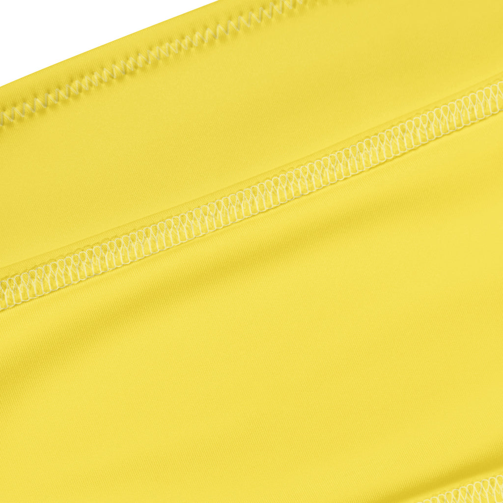 Women’s yellow recycled bandeau bikini fabric with bright yellow stretchy material and neat parallel stitching lines