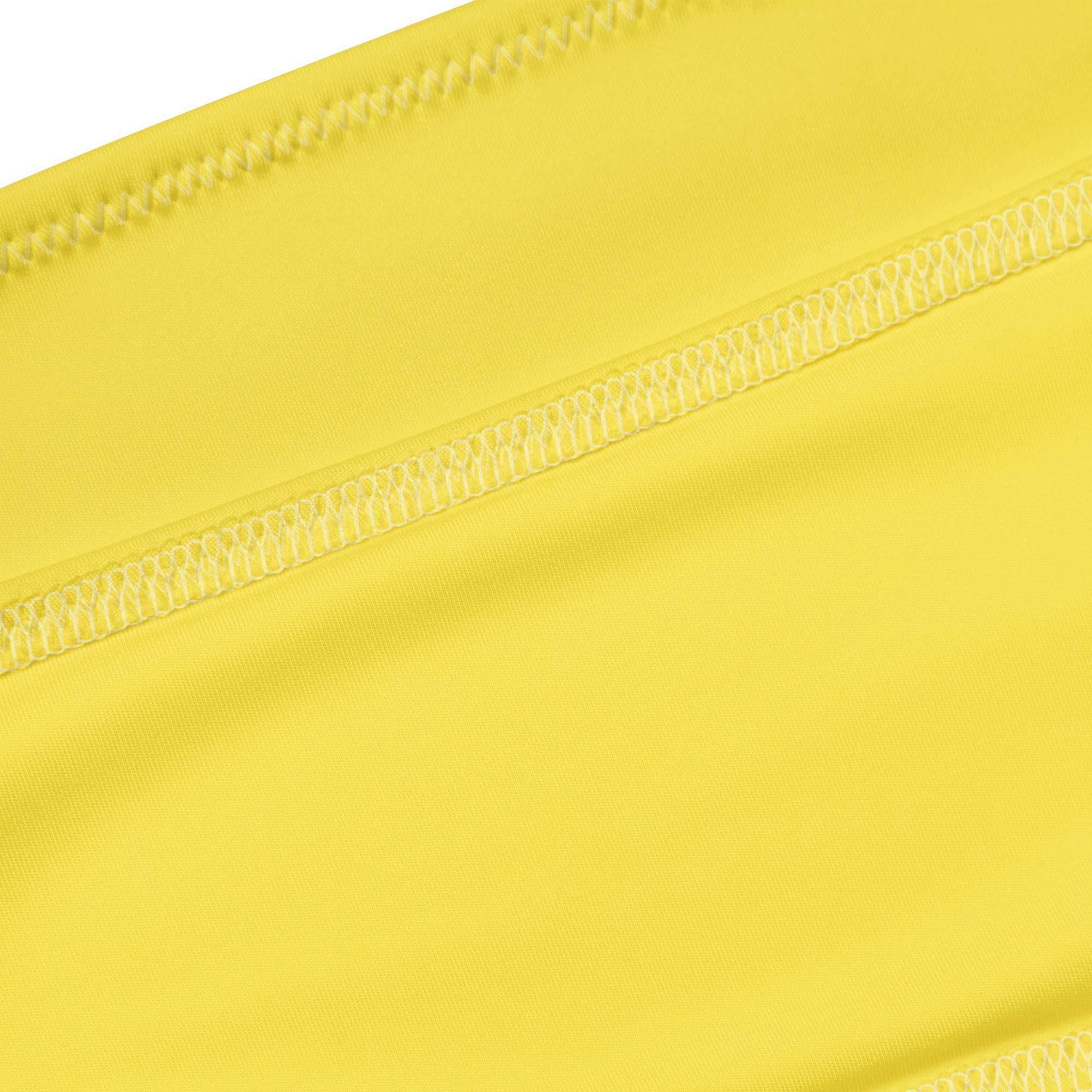 Women’s yellow recycled bandeau bikini fabric with bright yellow stretchy material and neat parallel stitching lines