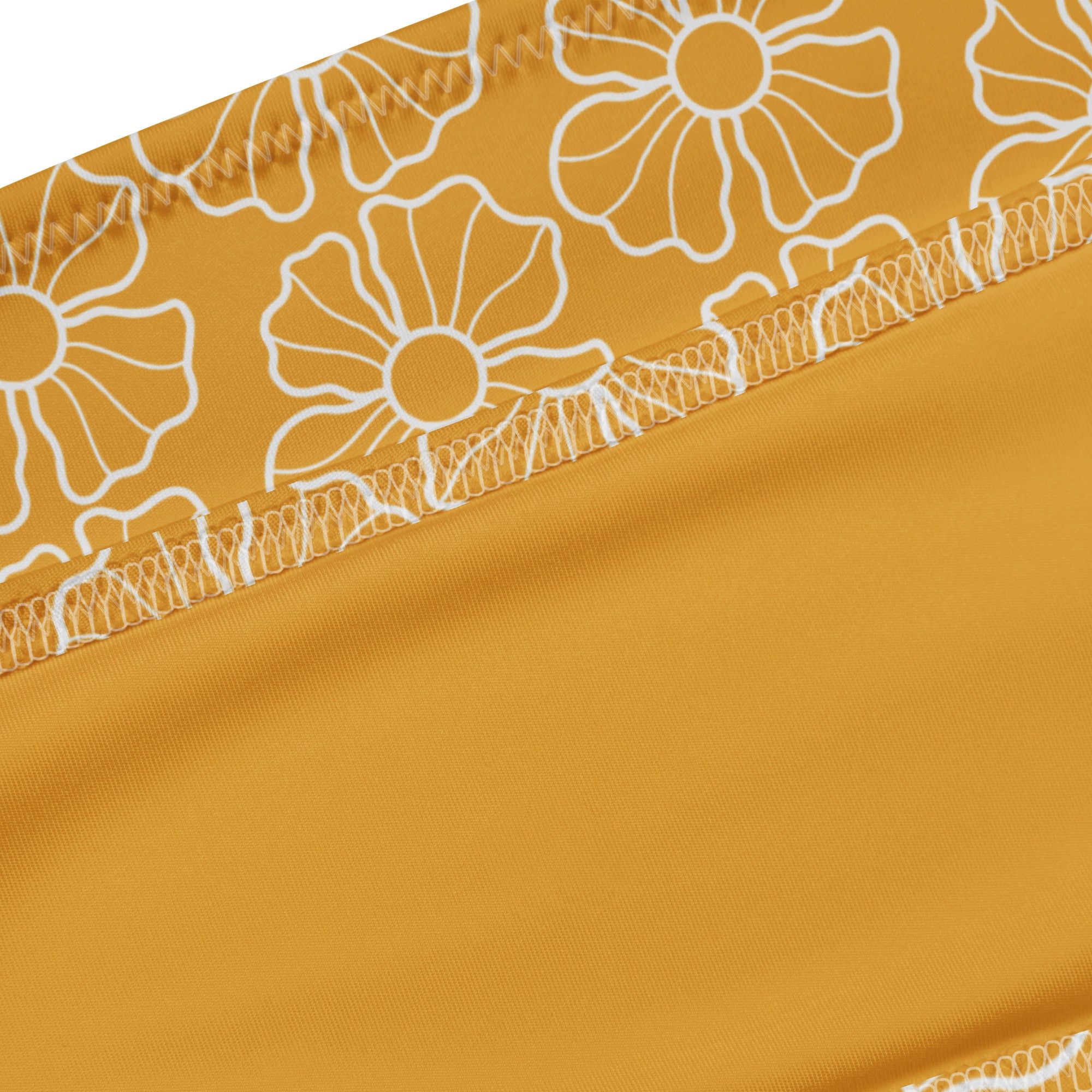 Women’s mustard yellow floral recycled bandeau bikini with white outlined pattern and zigzag stitching quick drying fabric upf 50+