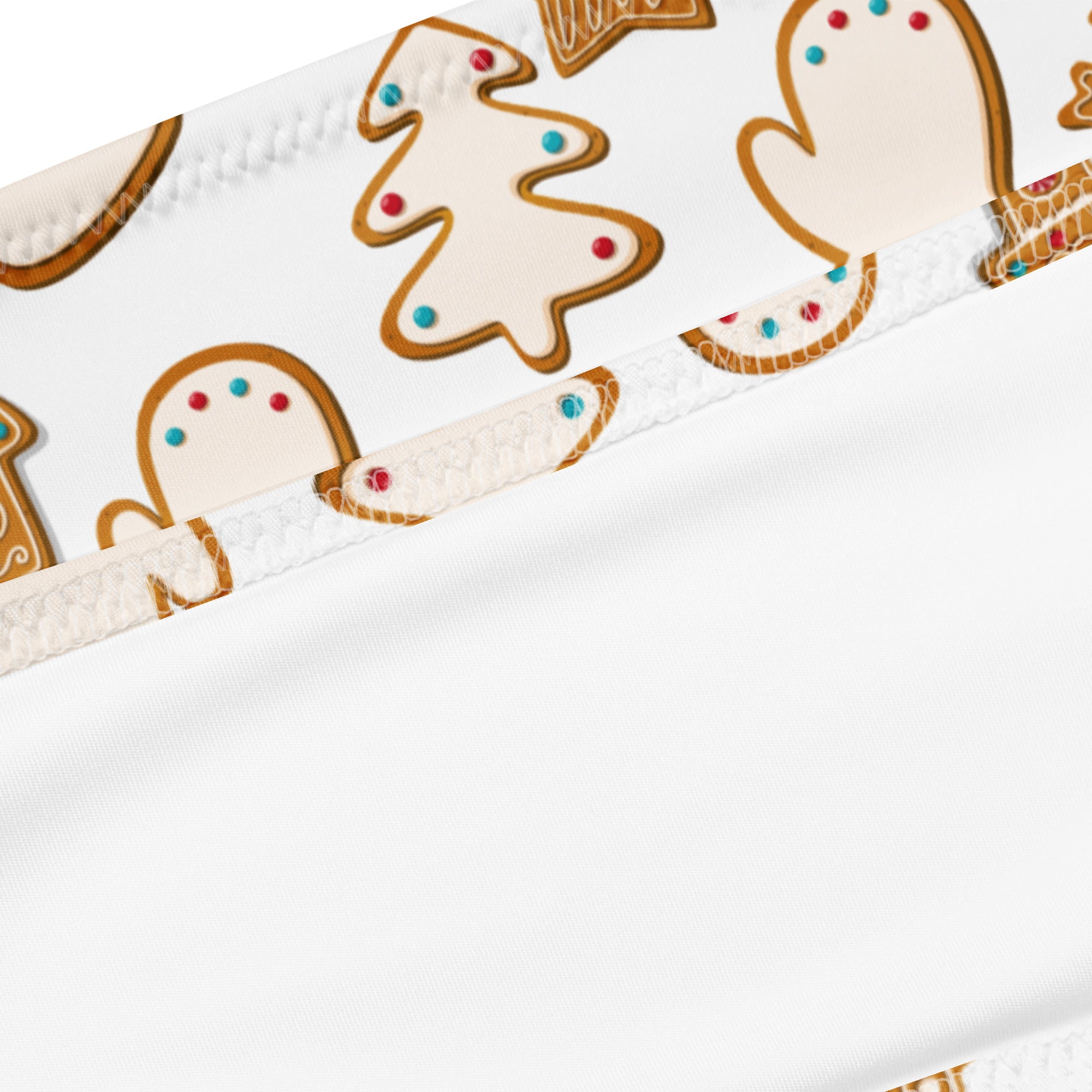 White recycled bandeau bikini headband with festive gingerbread cookie pattern in quick drying fabric with upf 50+