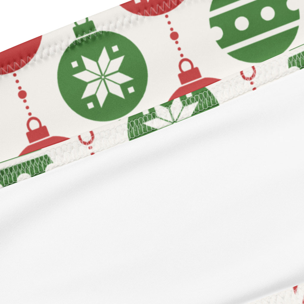 White recycled bandeau bikini with festive green and red christmas ornaments and snowflakes quick drying fabric upf 50+