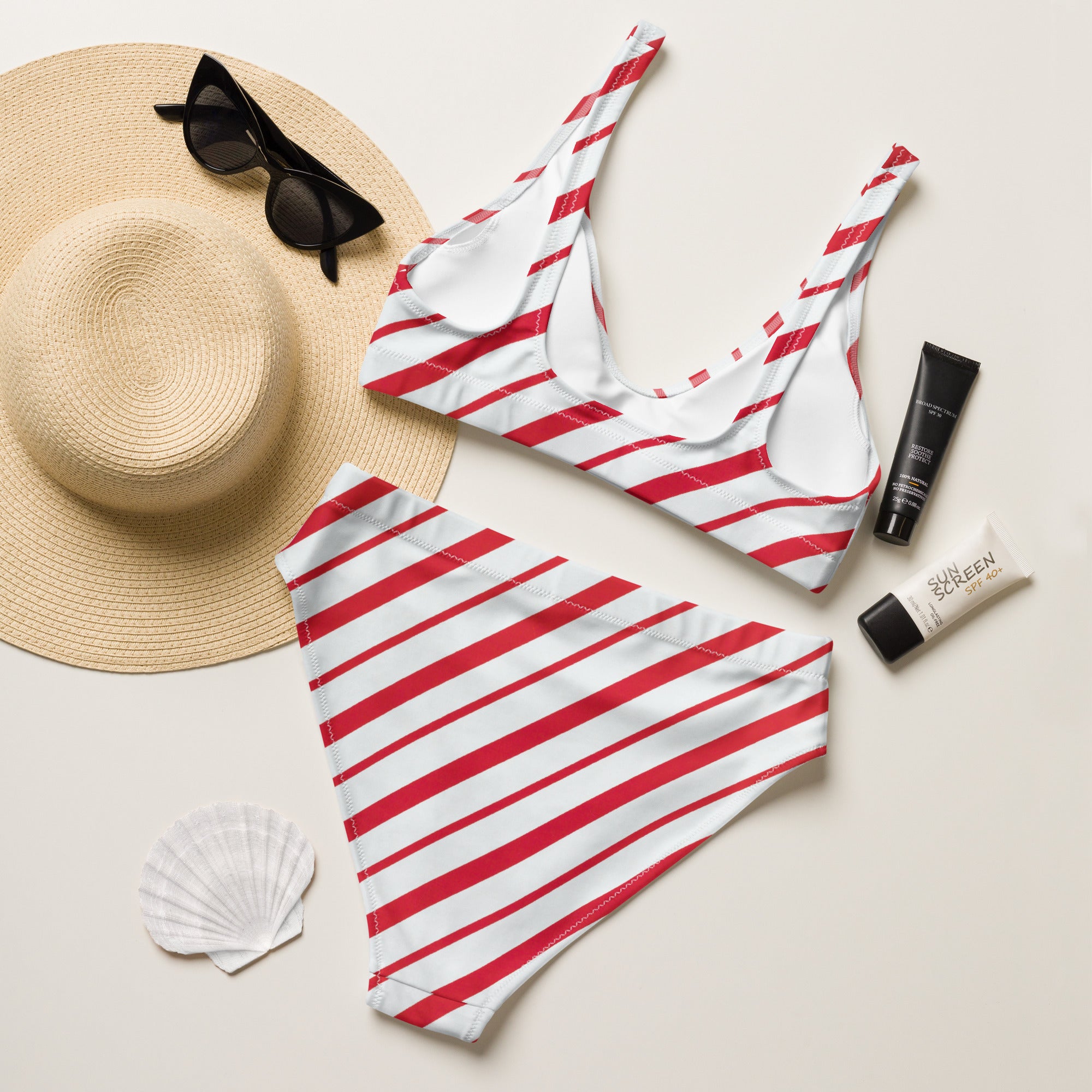 Women’s red candy cane striped two-piece recycled bikini with quick drying fabric and upf 50 plus protection