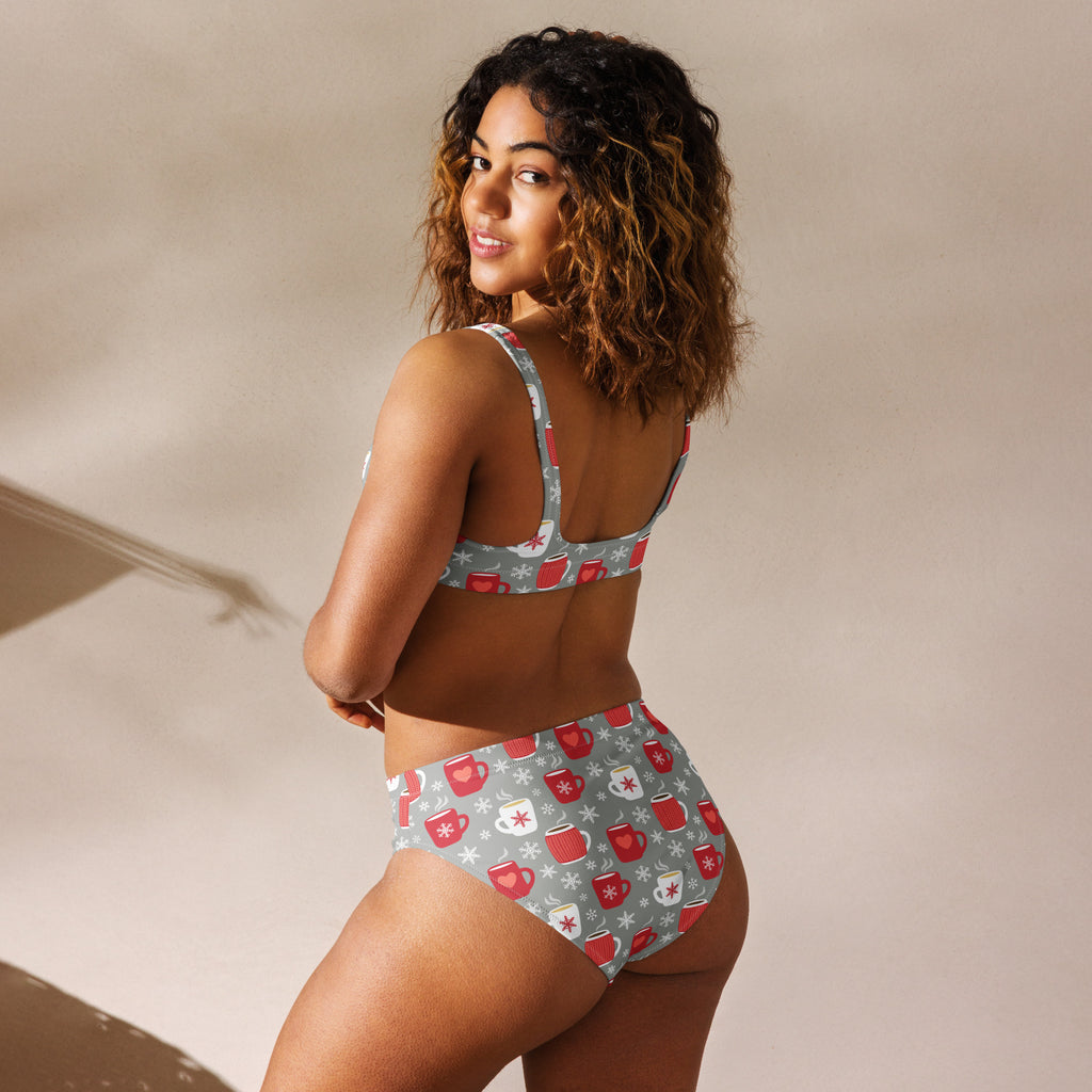 Gray recycled bikini set with snowflake patterns and red coffee mug featuring quick drying fabric and UPF 50 plus protection