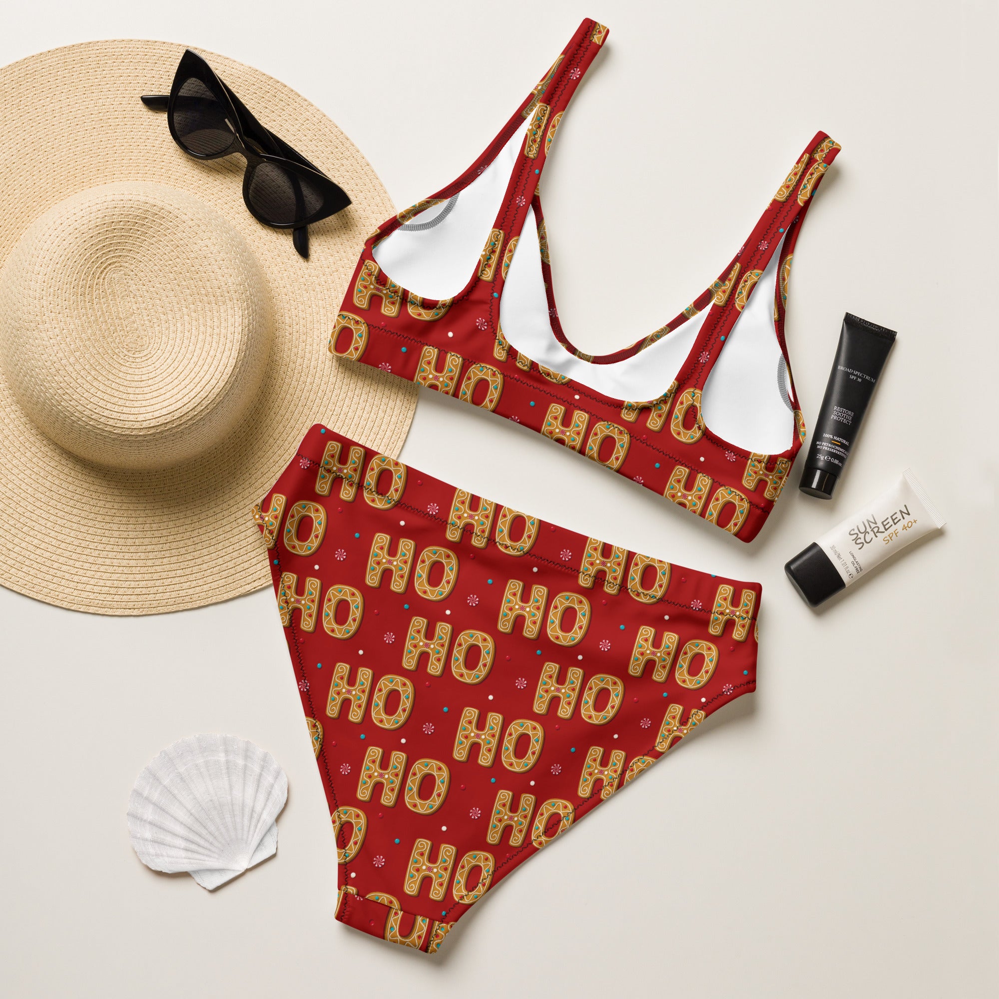 Women’s red and gold ho ho ho patterned recycled bikini with white lining quick drying fabric upf 50 plus