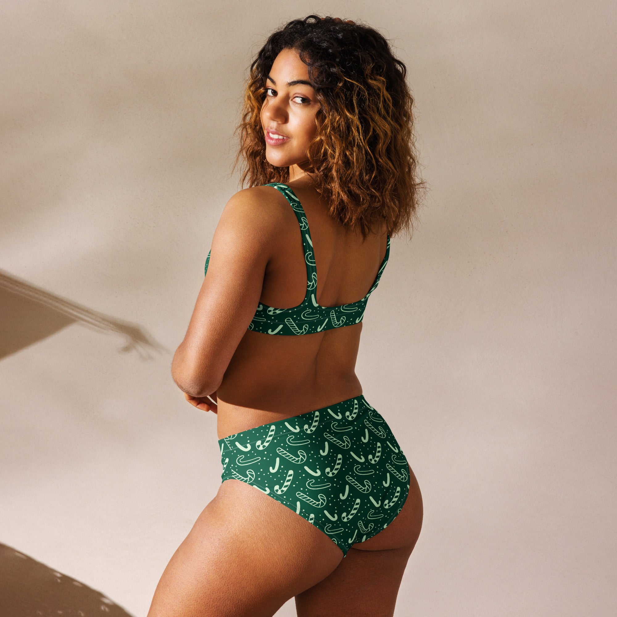 Women’s green candy cane patterned recycled bikini set with quick drying fabric and upf 50 plus sun protection