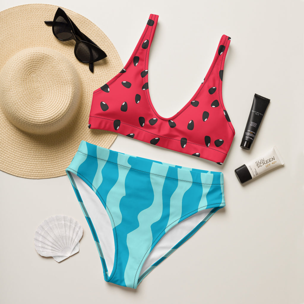A vibrant red and black watermelon-patterned women’s padded recycled bikini top with v-neckline and UPF 50+ fabric