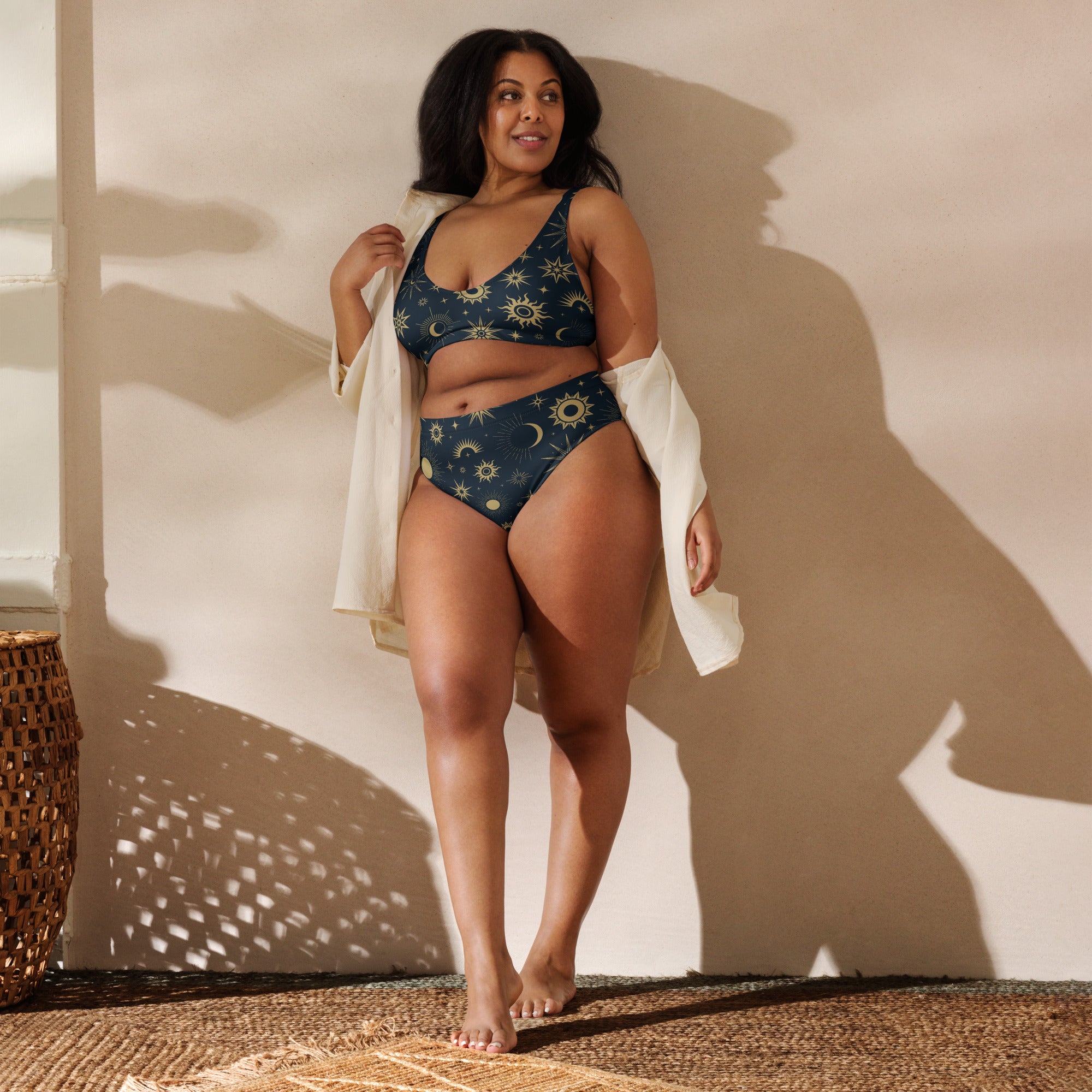 Dark blue women’s celestial sun and moon two-piece padded bikini with gold stars quick drying recycled fabric upf 50+