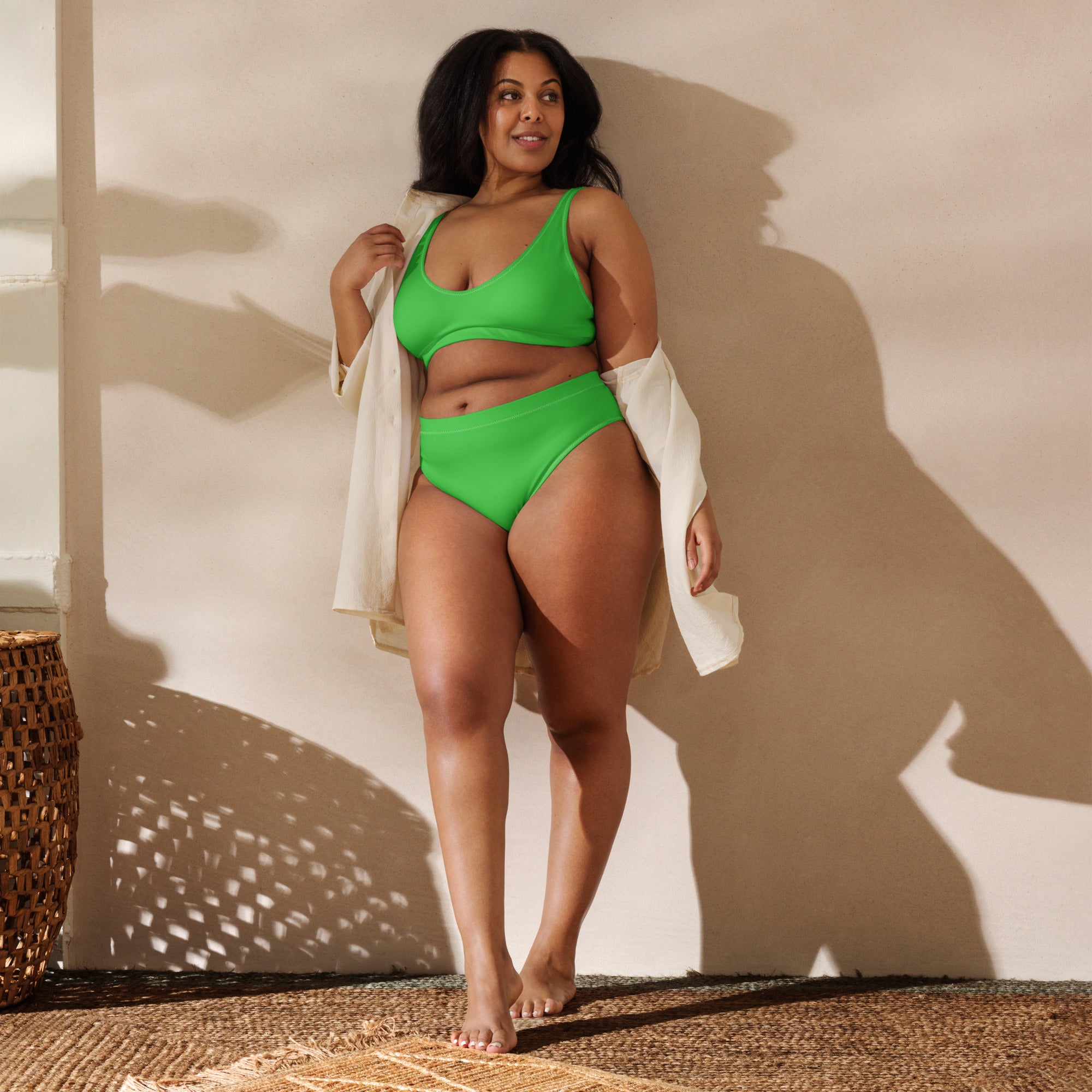 Women’s green two-piece padded recycled bikini with supportive bra top and high-cut briefs quick drying fabric upf 50+