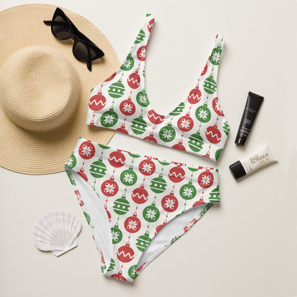 White bikini set with red and green christmas ornaments snowflakes and wavy lines made from recycled quick drying fabric with upf 50+