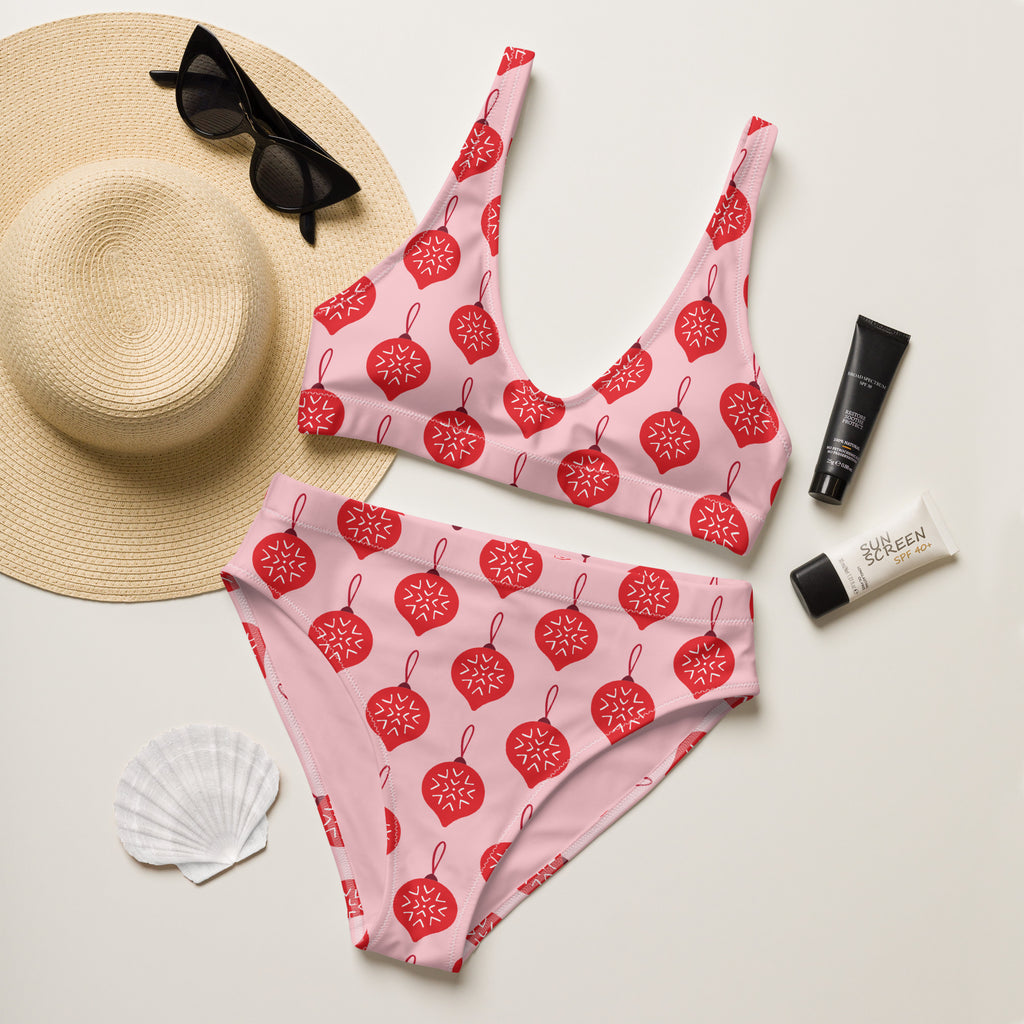 Women’s pink recycled bikini with red christmas ornament pattern quick drying fabric and upf 50 plus protection