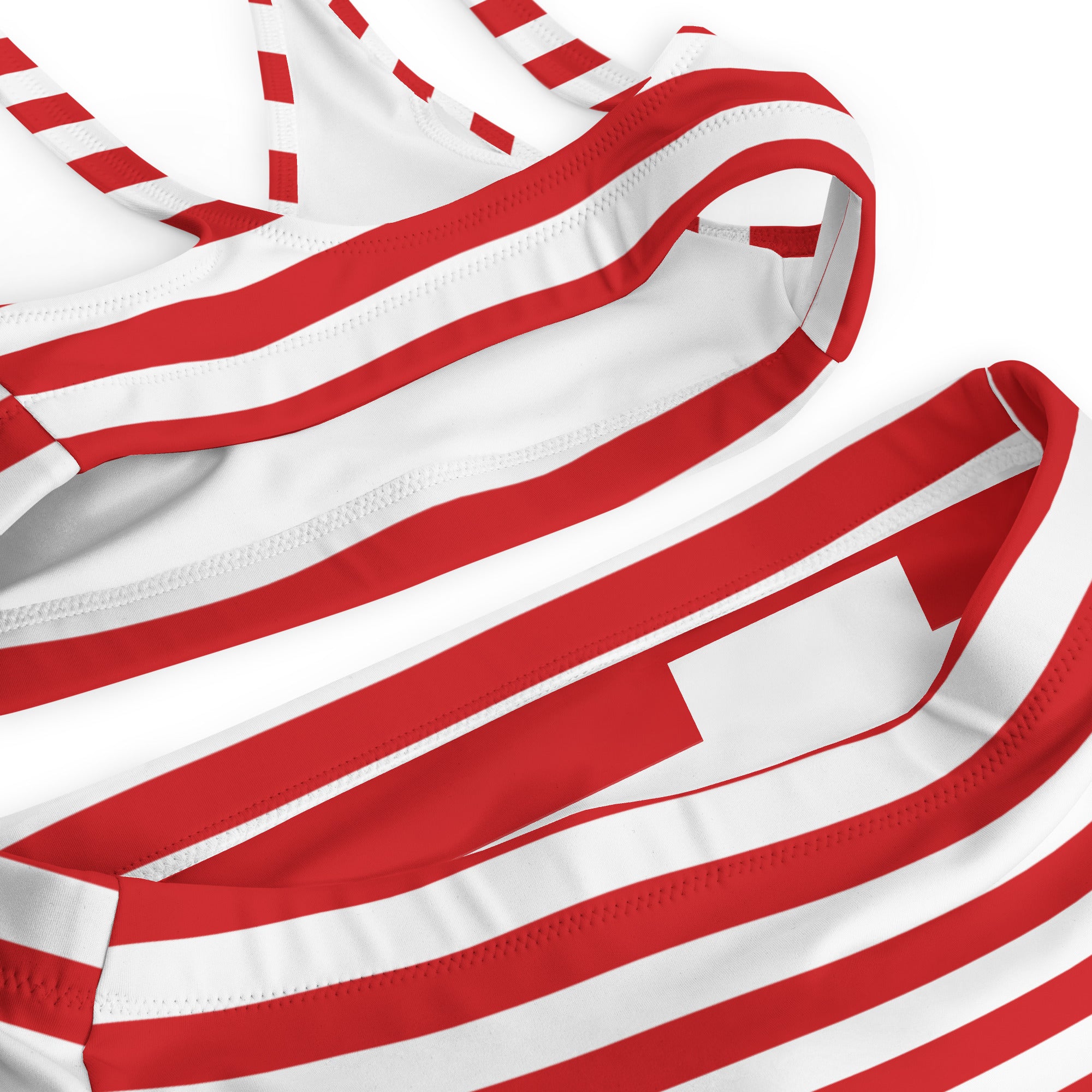 Women’s red and white striped bikini top with halter neck design made from quick drying recycled fabric with upf 50+