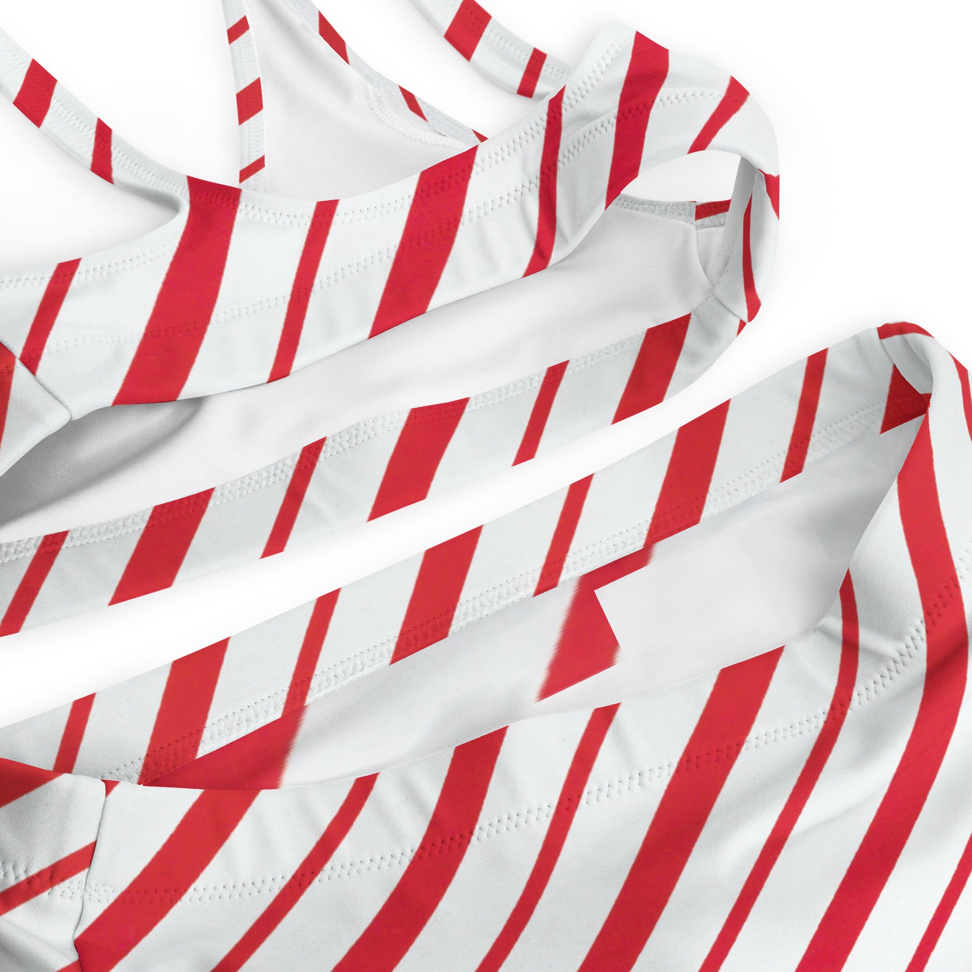 Women’s red candy cane striped recycled bikini with white and red diagonal stripes and quick drying upf 50 plus fabric