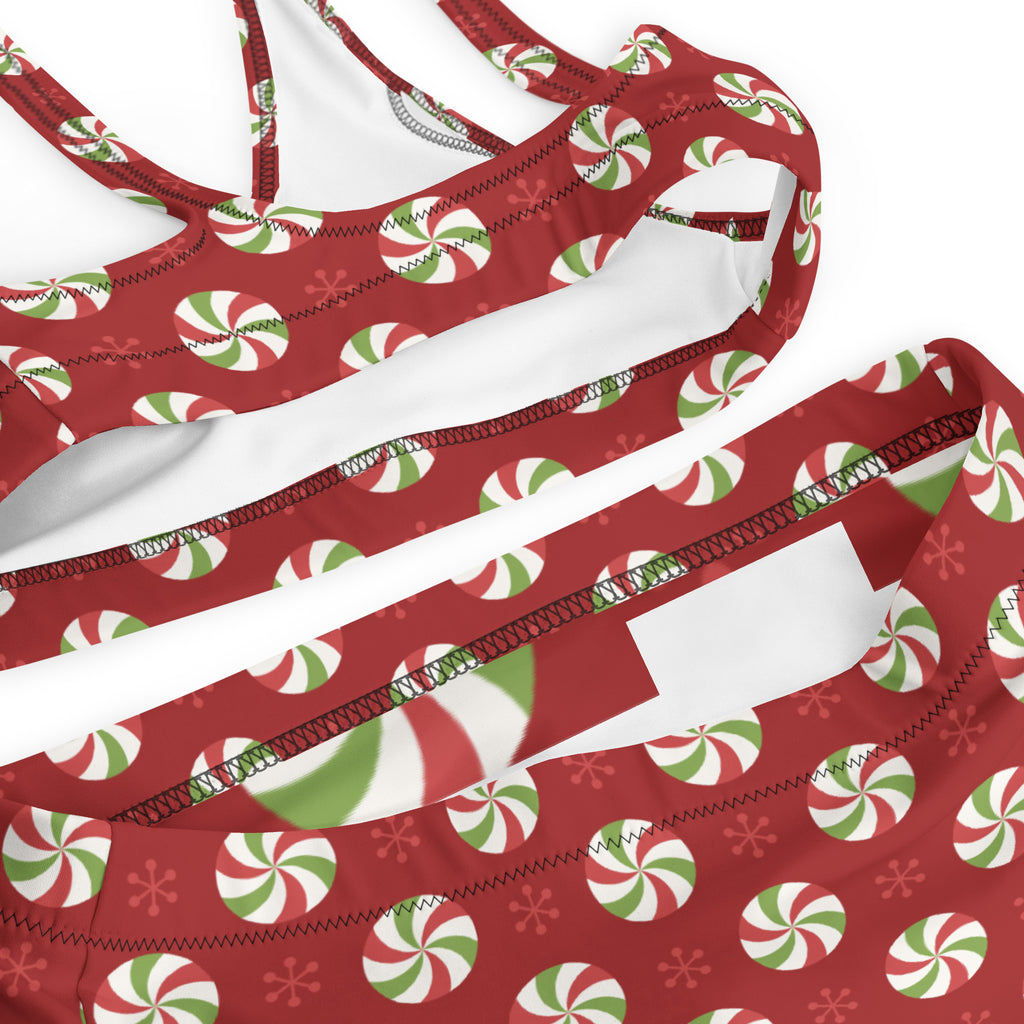 Women’s red and green peppermint swirl two-piece recycled bikini with white trim quick drying fabric upf 50+