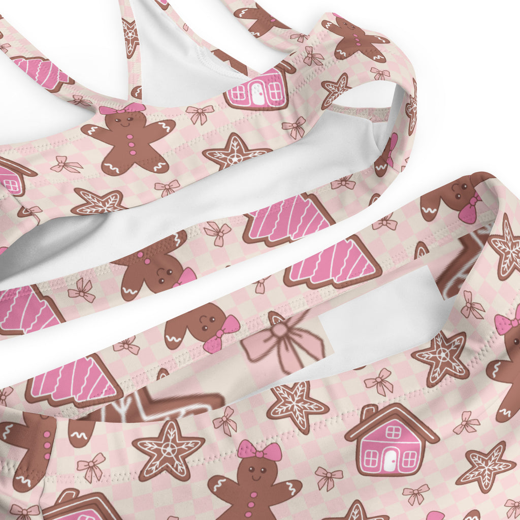 Women’s pink gingerbread christmas recycled bikini top with playful gingerbread print quick drying fabric upf 50+
