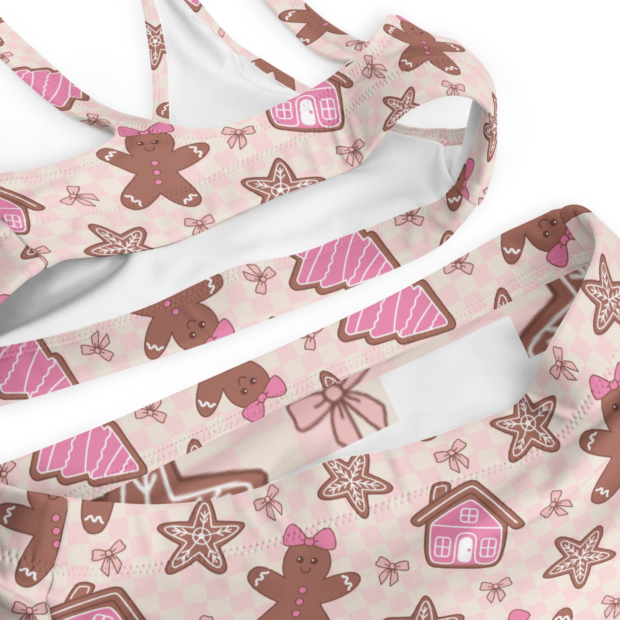 Women’s pink gingerbread christmas recycled bikini top with playful gingerbread print quick drying fabric upf 50+