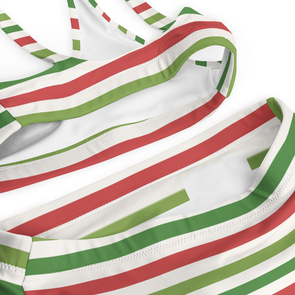 Women’s christmas stripe recycled bikini top in white with red and green stripes made of quick drying stretchy fabric with upf 50+