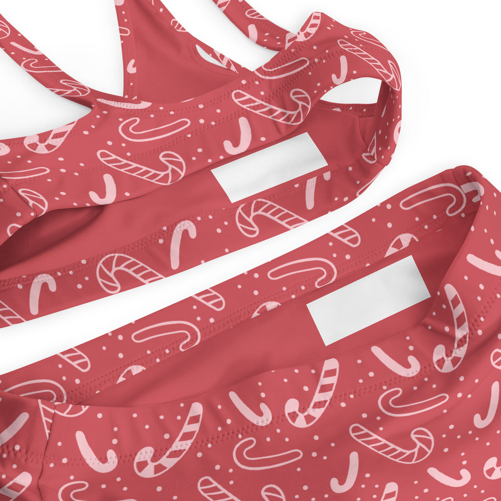 Women’s red candy cane patterned recycled bikini set with white outlines and dotted accents quick drying fabric upf 50+