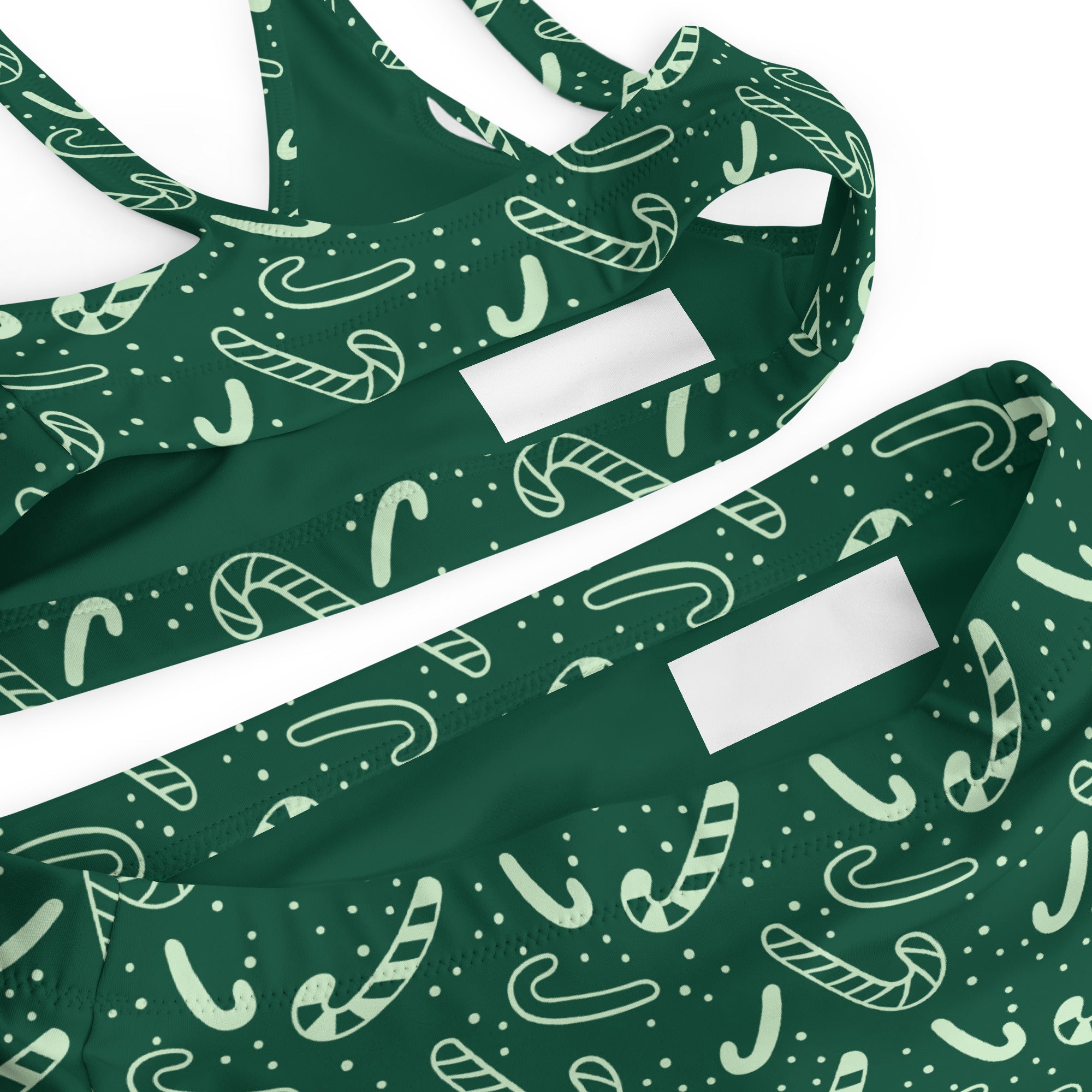Women’s dark green two-piece recycled swimsuit with light mint and white candy cane pattern quick drying fabric upf 50+
