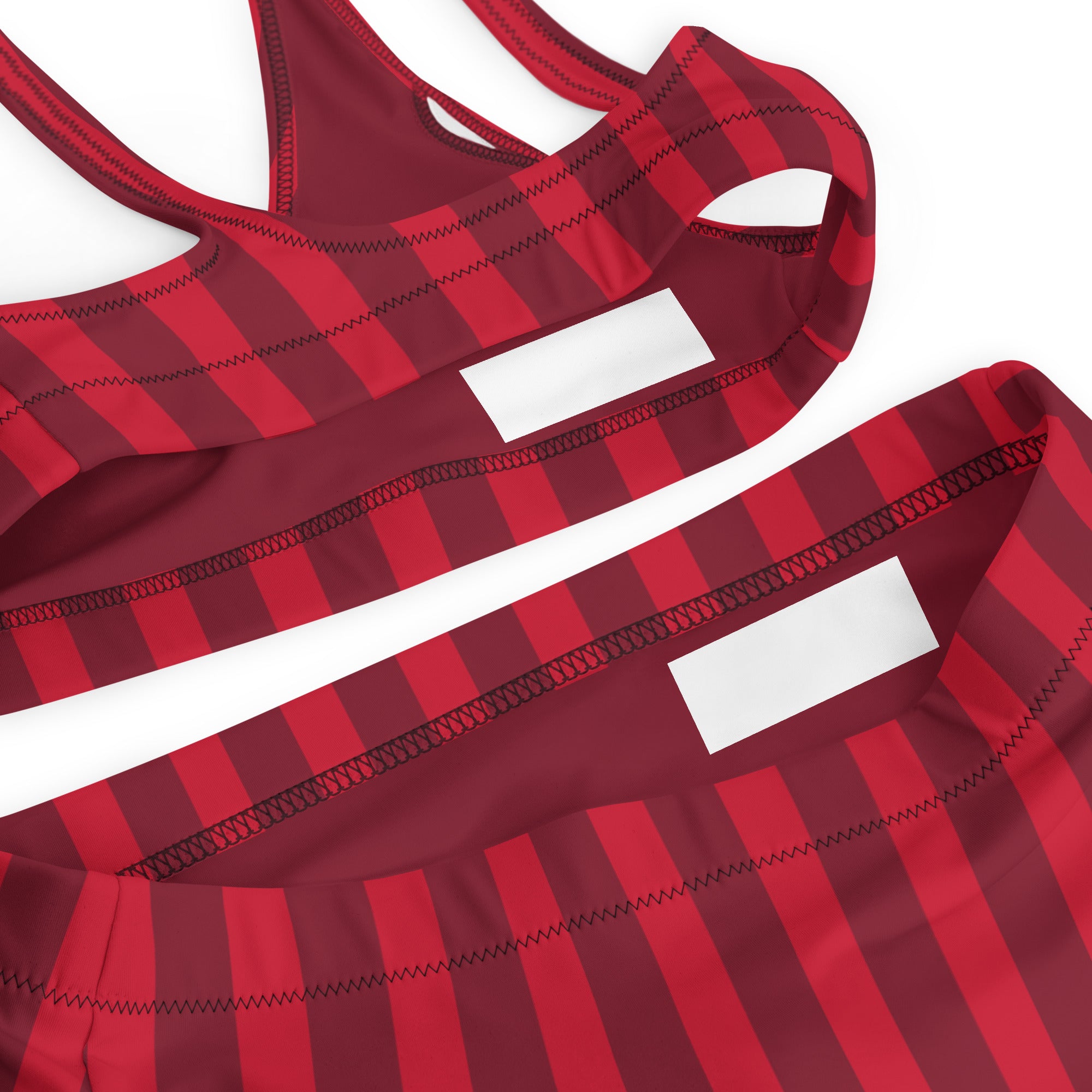 Women’s deep red stripe recycled bikini in red and maroon plaid with black zigzag stitching and upf 50 plus quick drying fabric